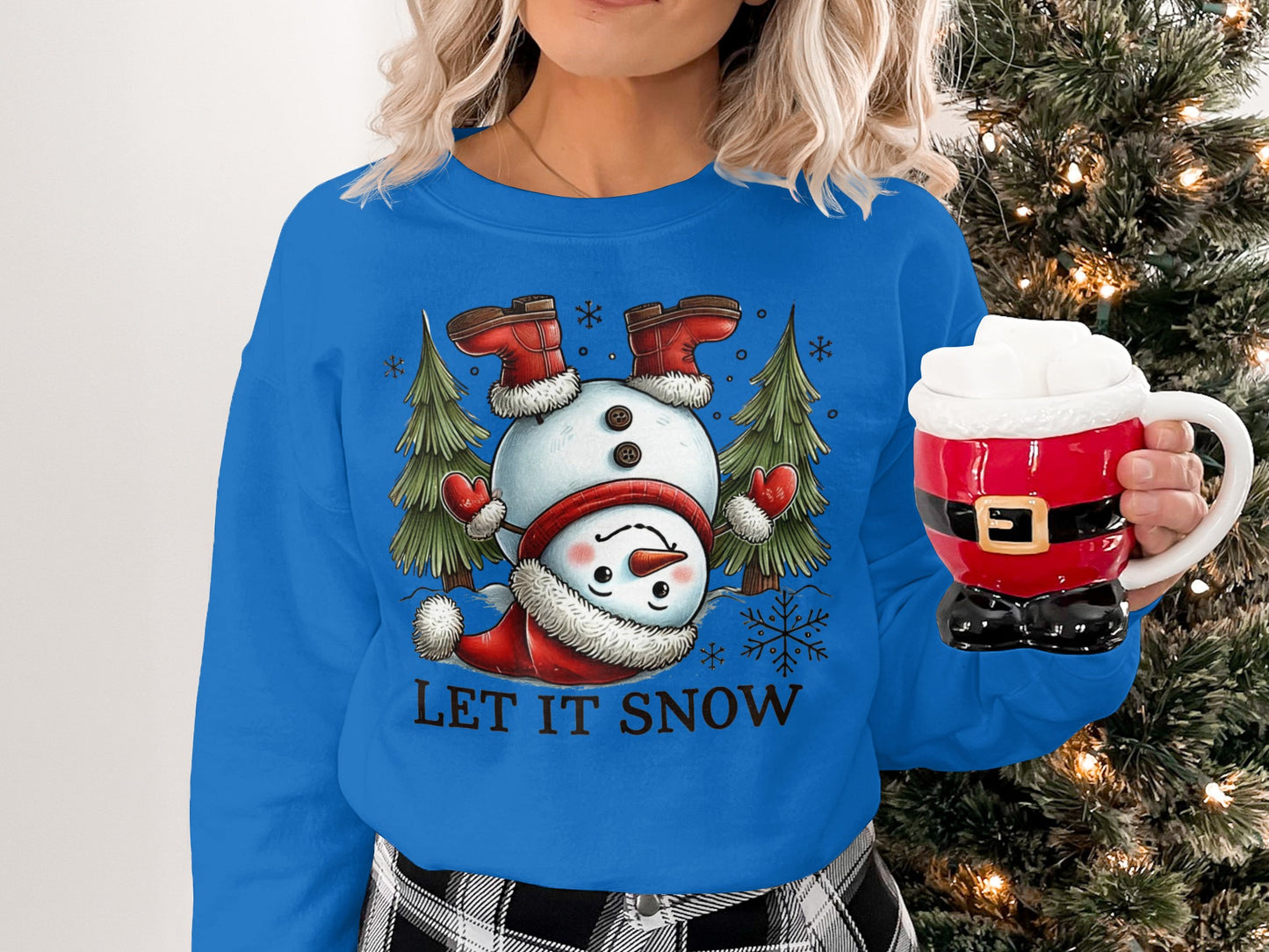 Let It Snow Snowman Holding a Santa Mug product