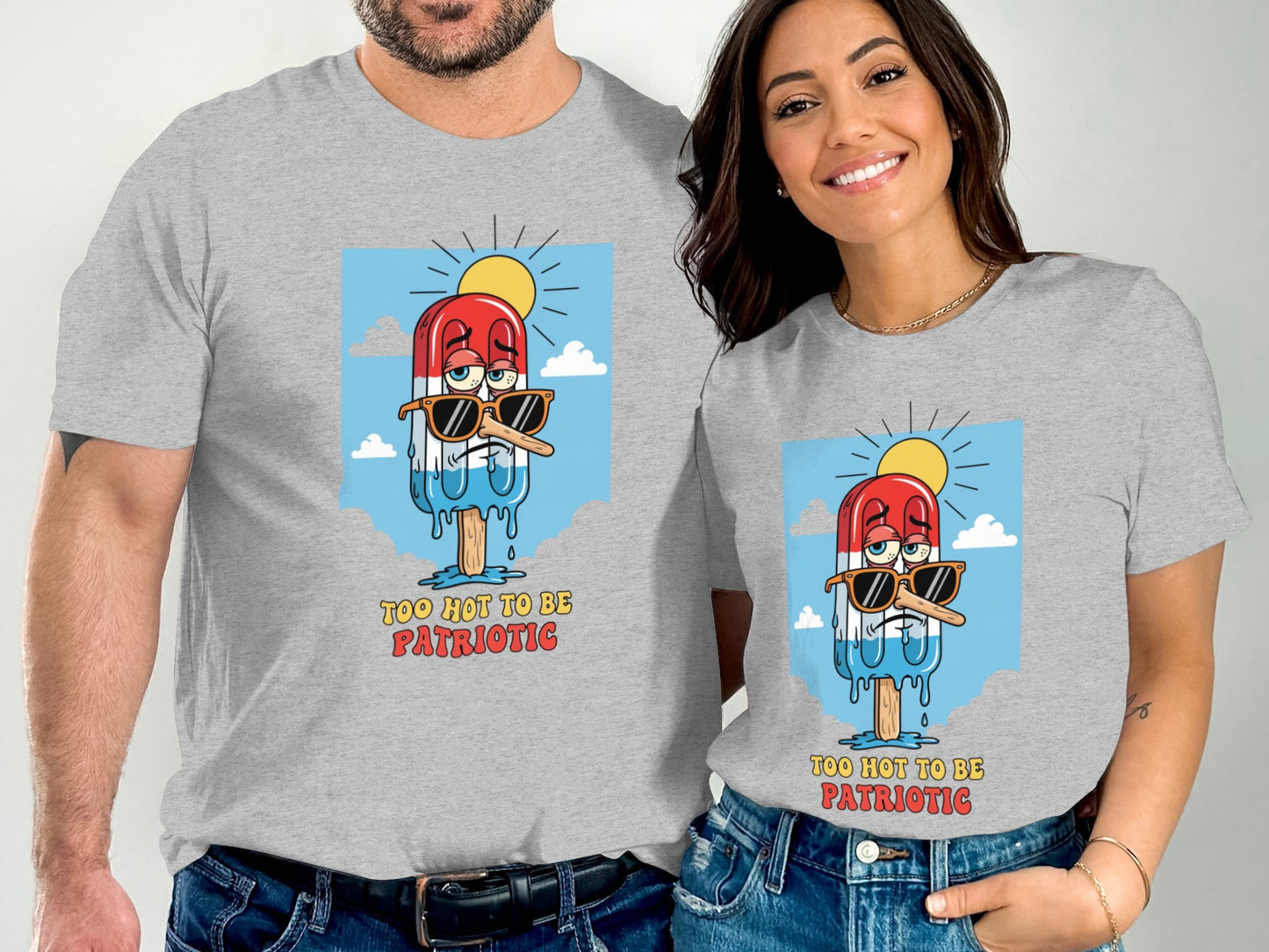 Couple wearing matching t-shirts with a melting popsicle graphic.