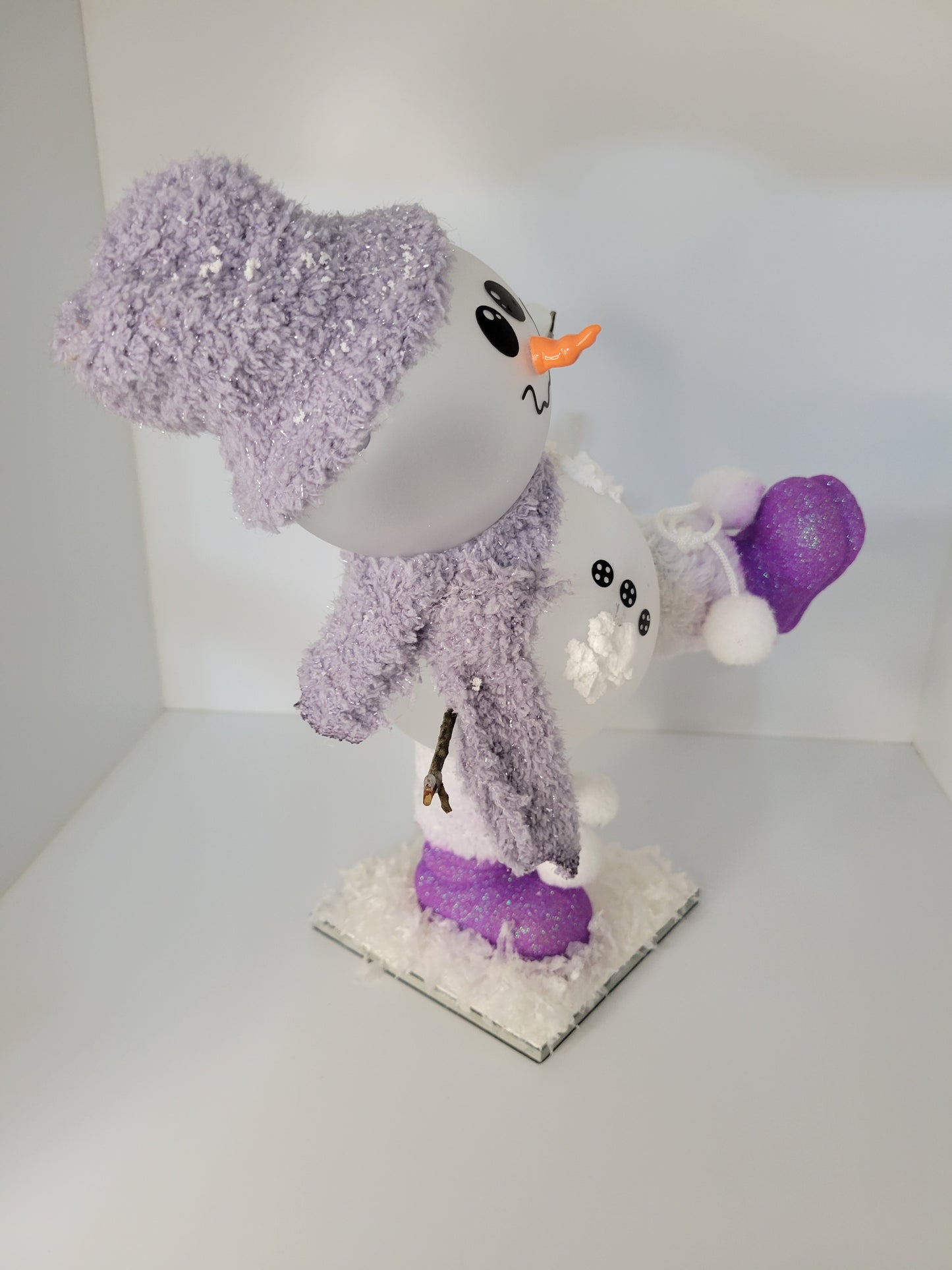 Adorable Snowman Decor with Purple Hat and Scarf