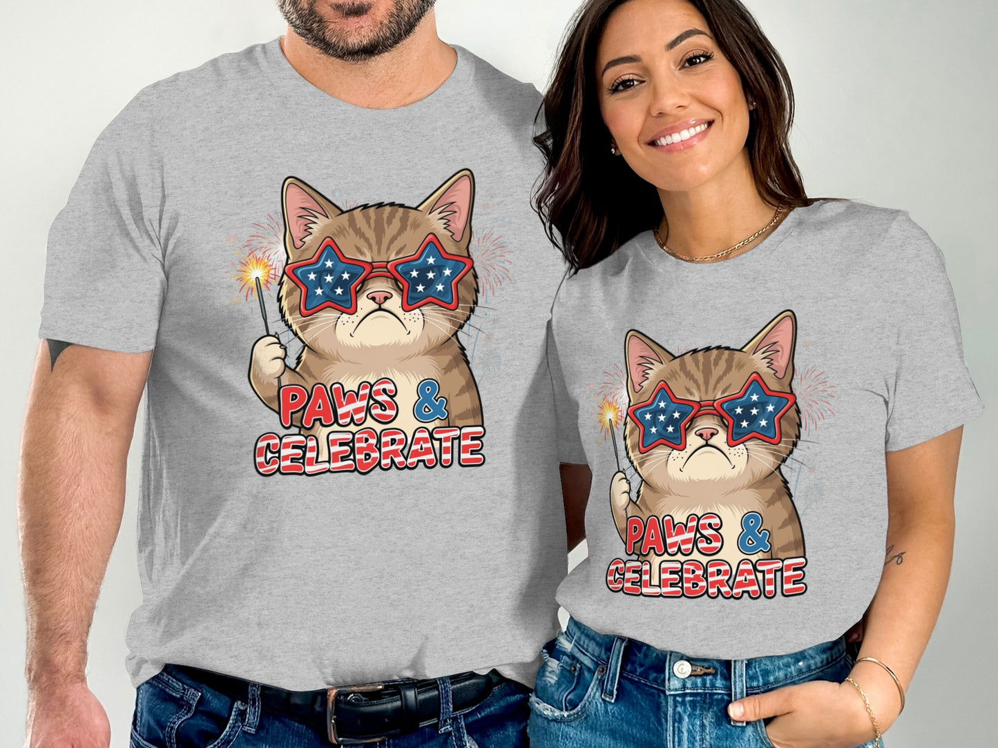 Couple wearing gray t-shirts with a cartoon cat wearing star sunglasses.