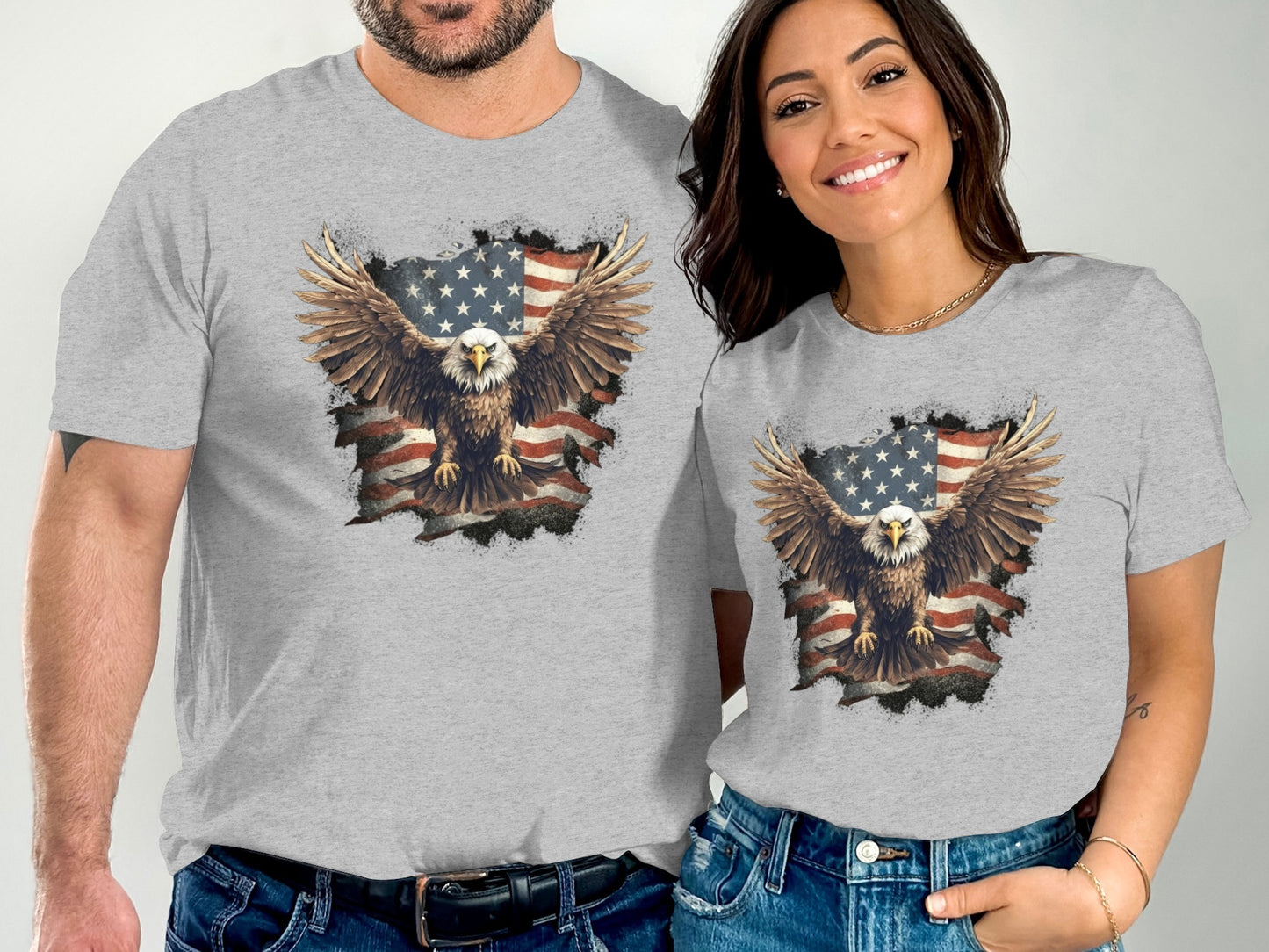 Two people wear grey t-shirts featuring a distressed American flag and an eagle.