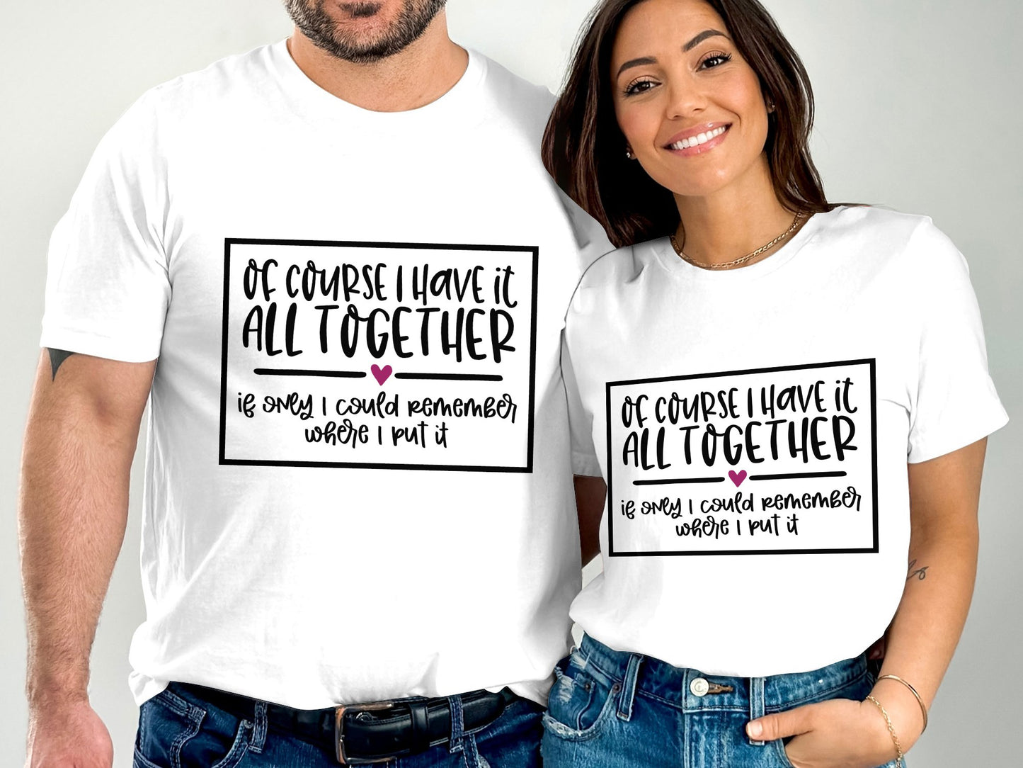 Couple wearing white funny slogan t-shirt with black text saying of course I have it all together