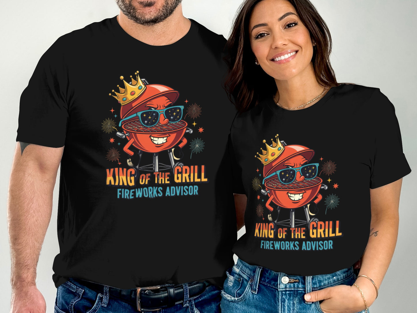 Two people wear black t-shirts featuring a cartoon grill with a crown, text "King of the Grill".