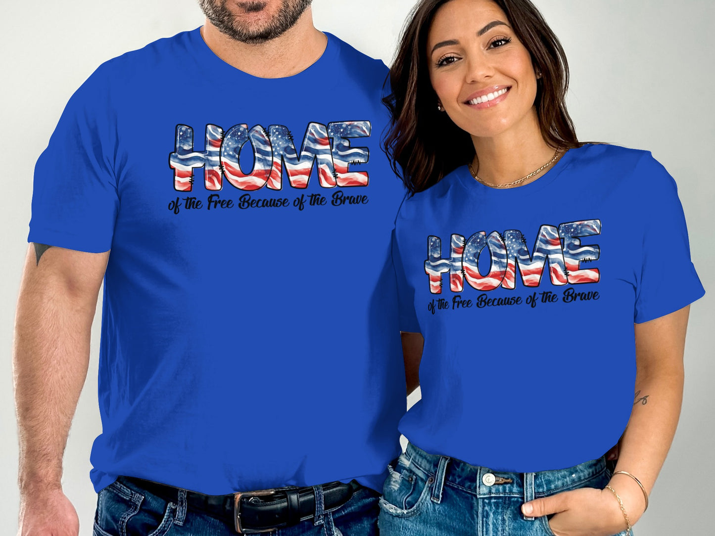 Couple wearing blue t-shirts with "HOME of the Free Because of the Brave" American flag design.