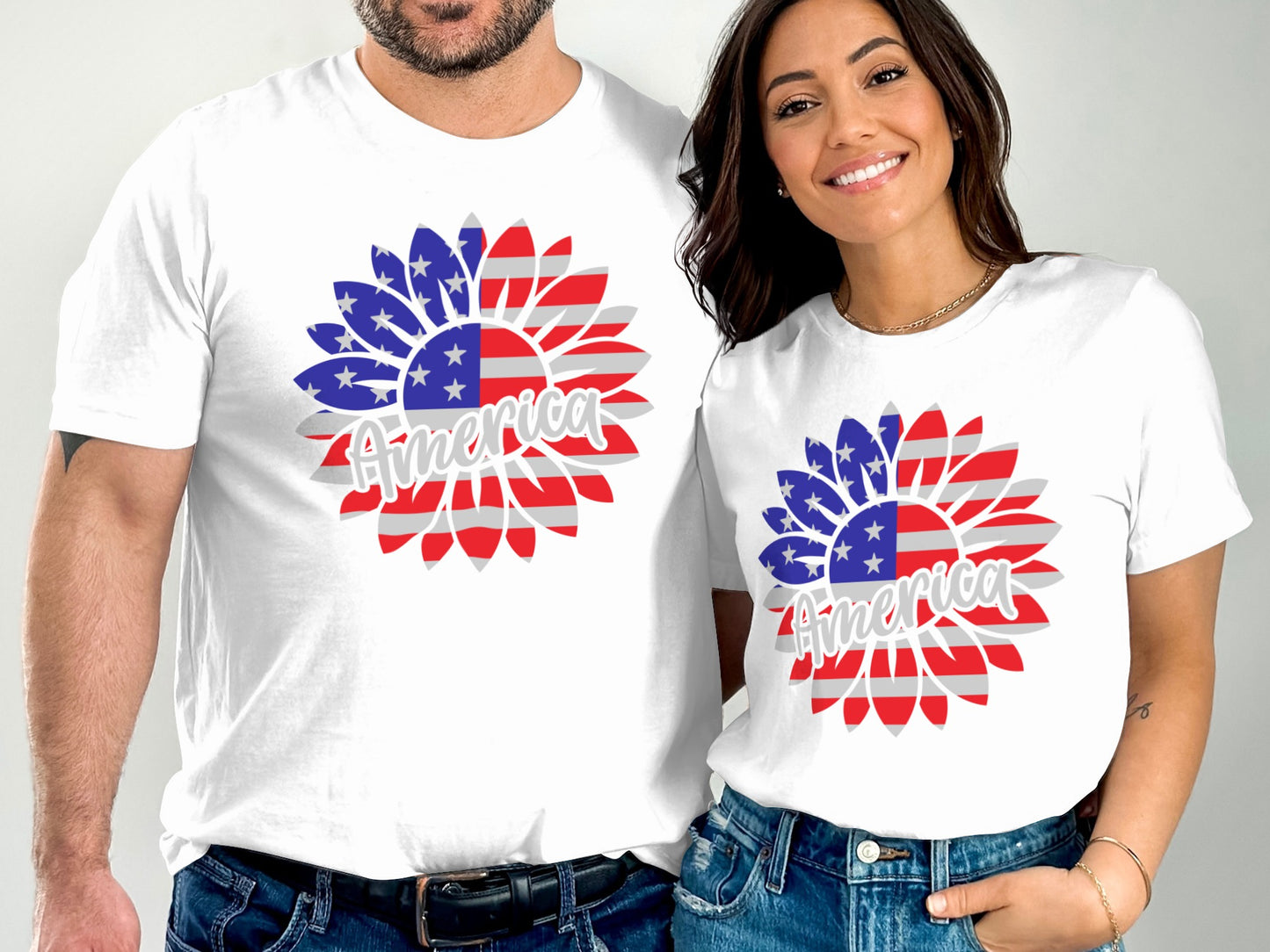 Couple wearing white t-shirts with American flag sunflower graphic and "America" text.