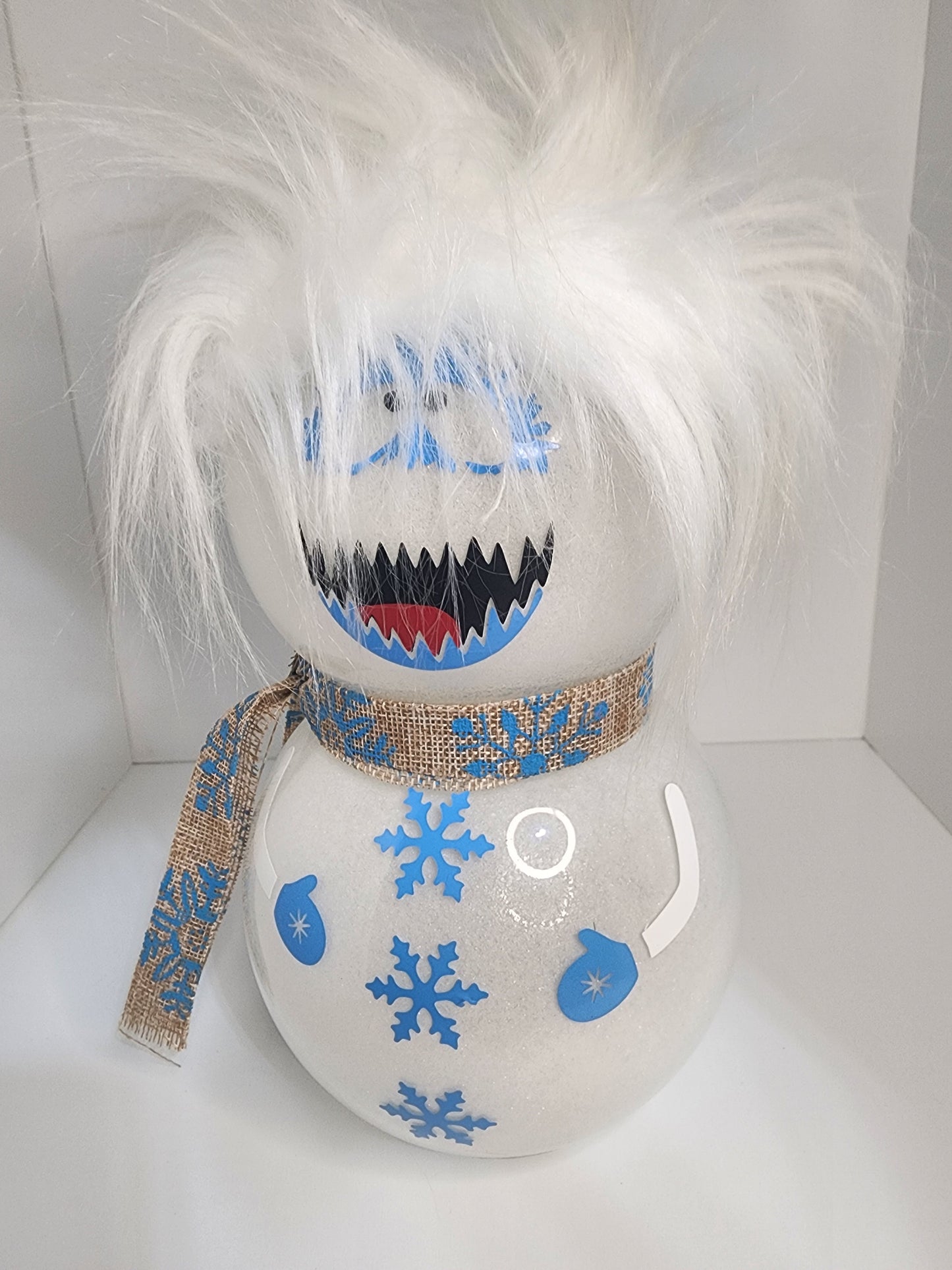 White Snowman with Blue Snowflake Decorations