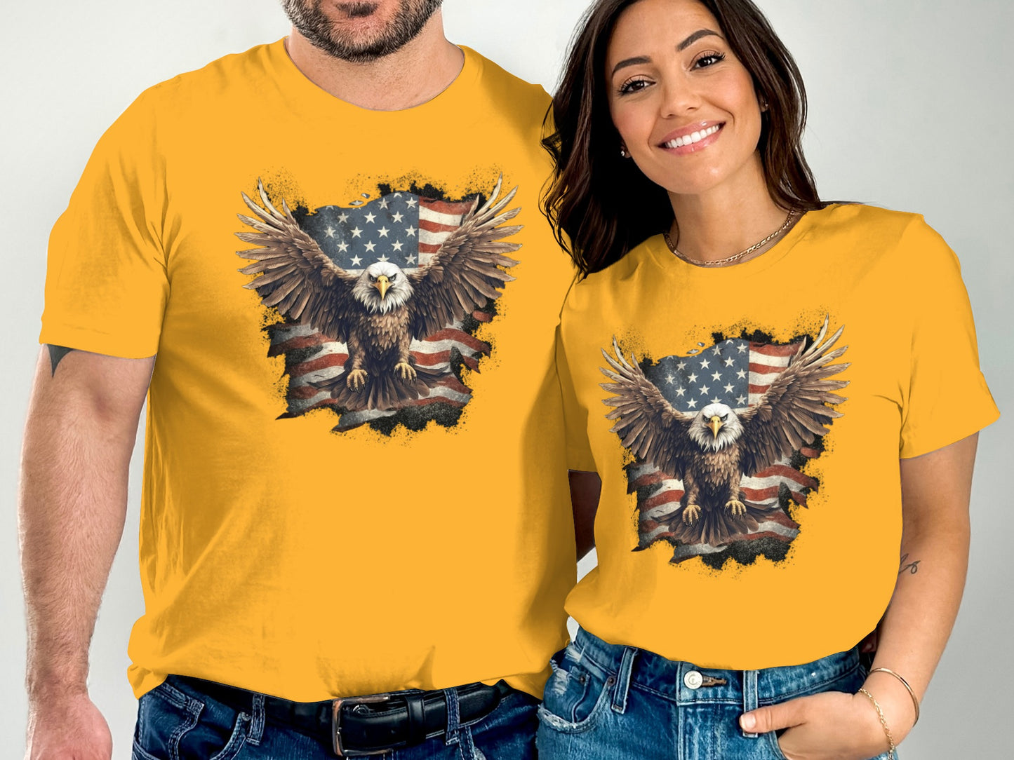 Two people wearing yellow t-shirts featuring a distressed American eagle graphic.