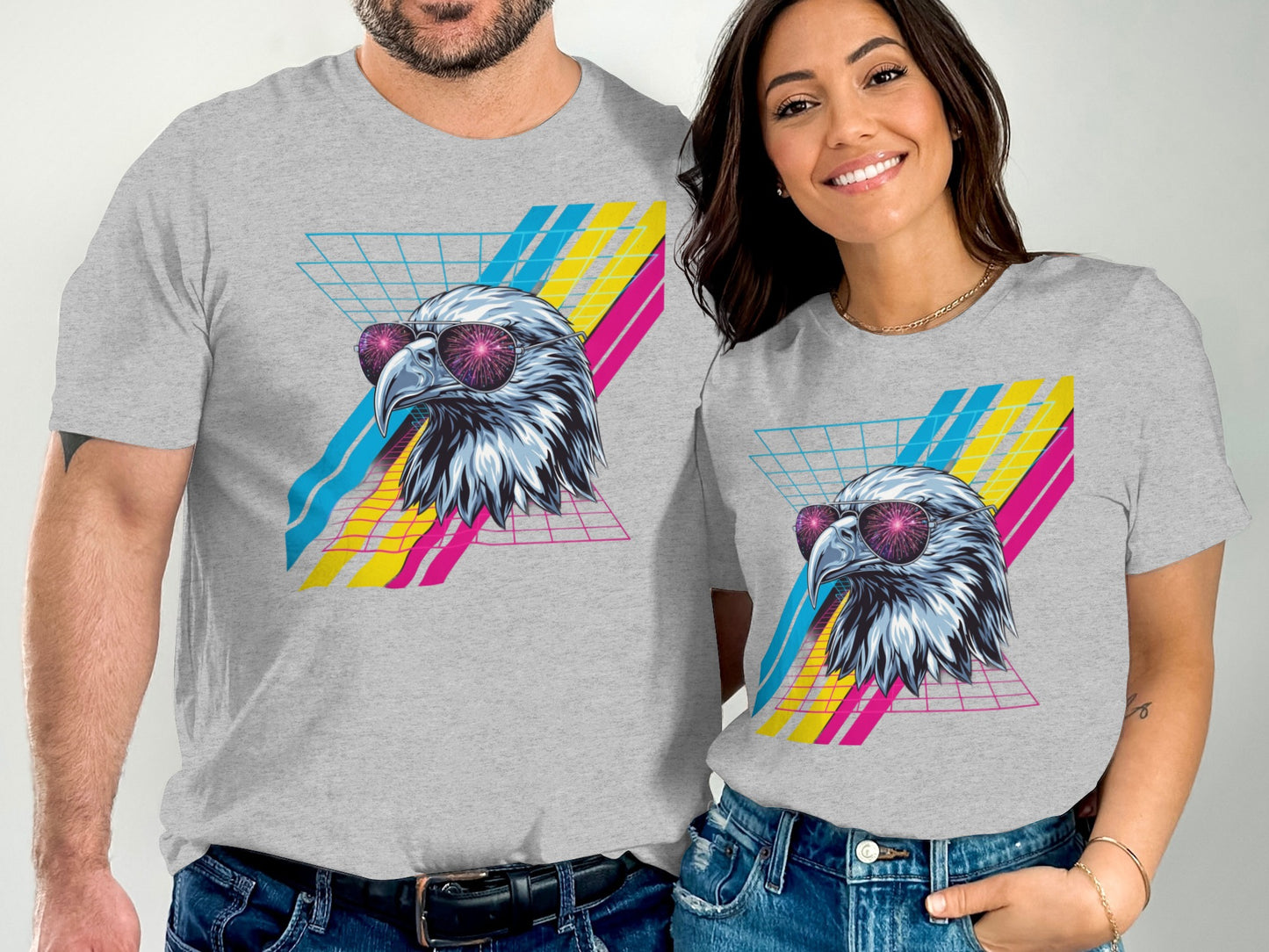 Eagle graphic on grey t-shirts with retro sunglasses and geometric background.