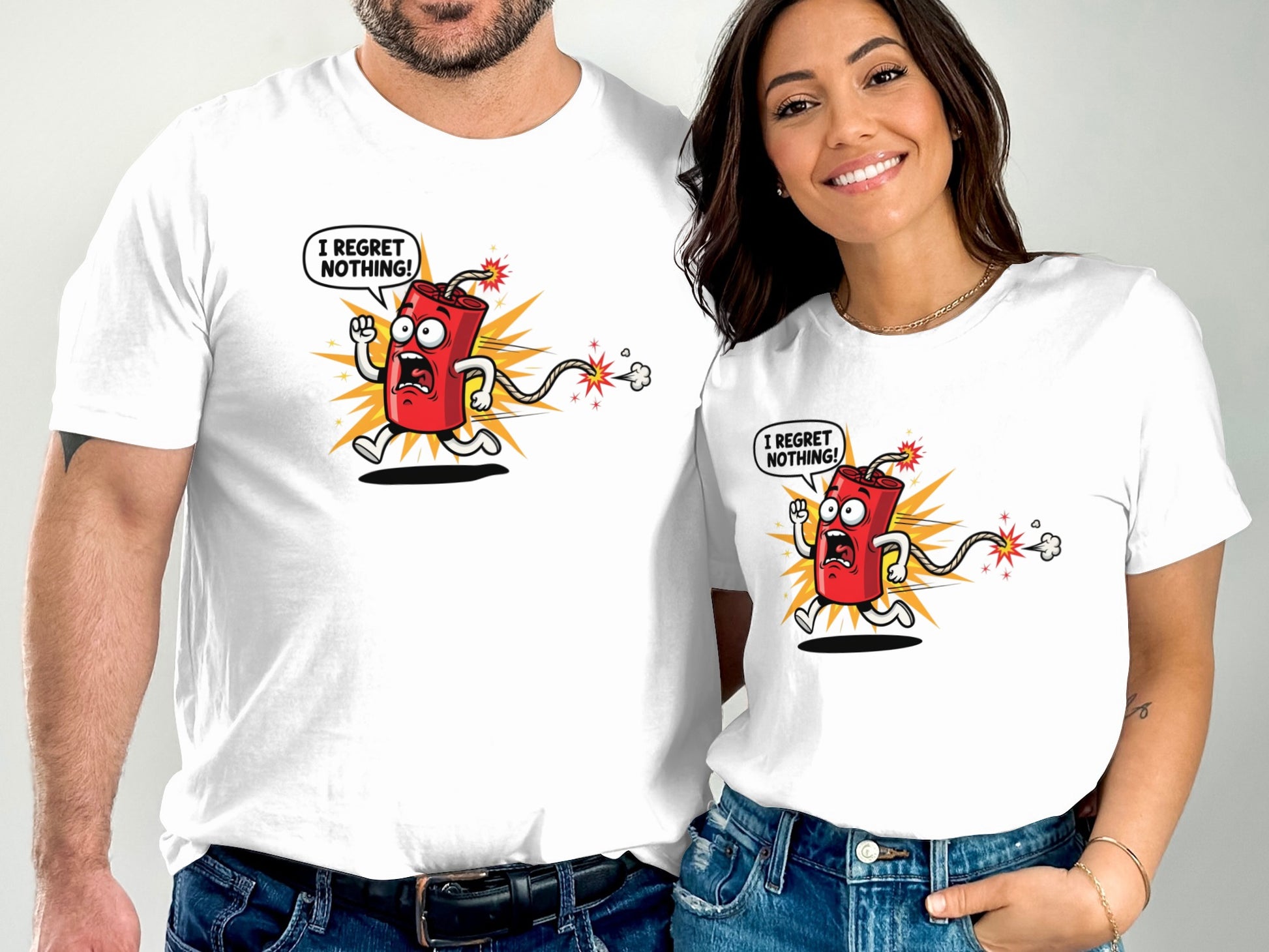 Two white t-shirts featuring a cartoon firecracker with "I REGRET NOTHING!" text.