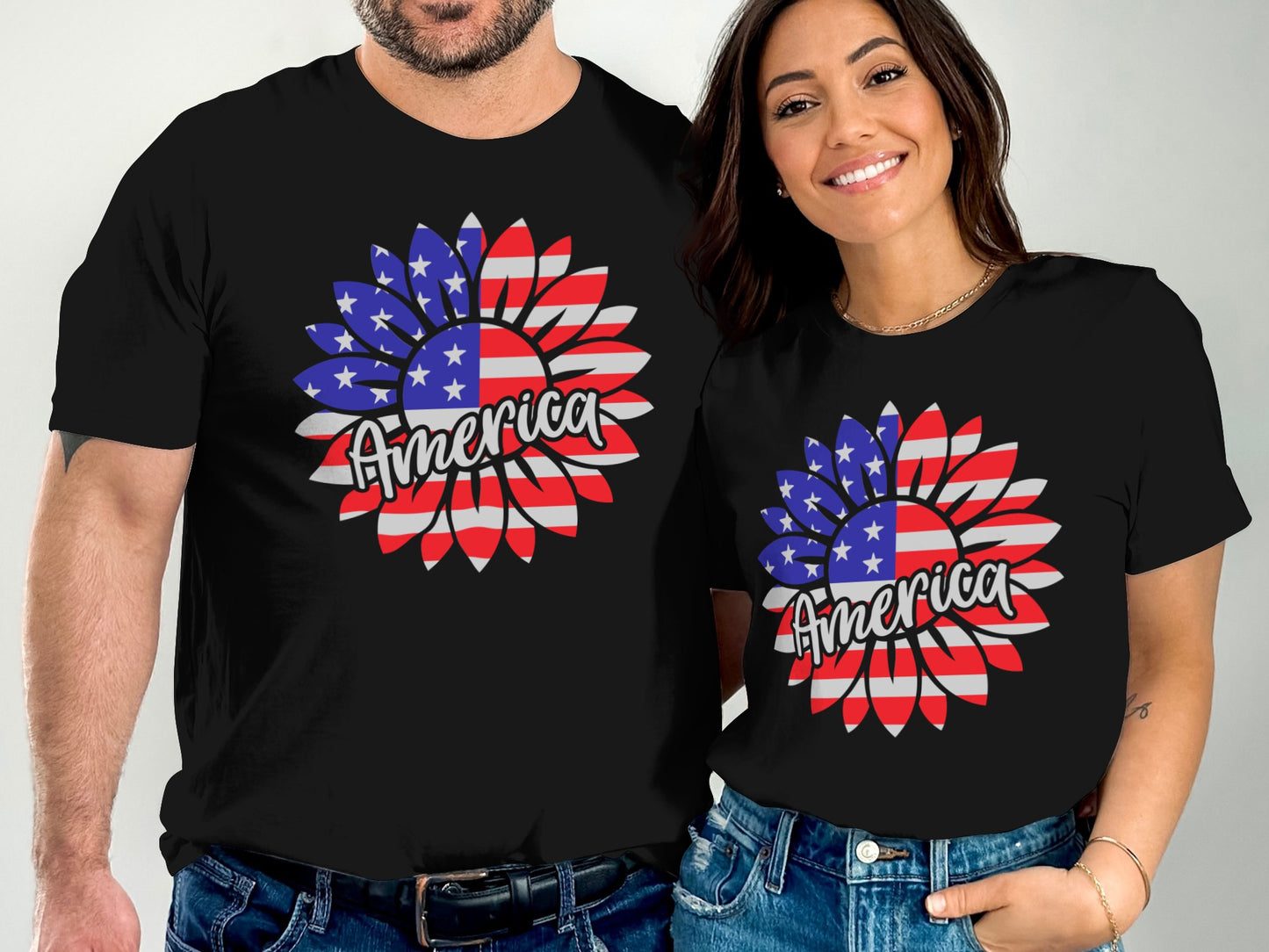 Couple wearing black t-shirts with sunflower flag print and "America" text.