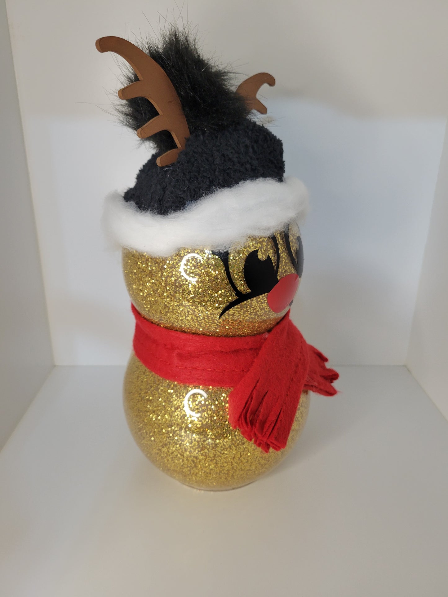 Festive Golden Snowman with Red Scarf and Hat Decorations
