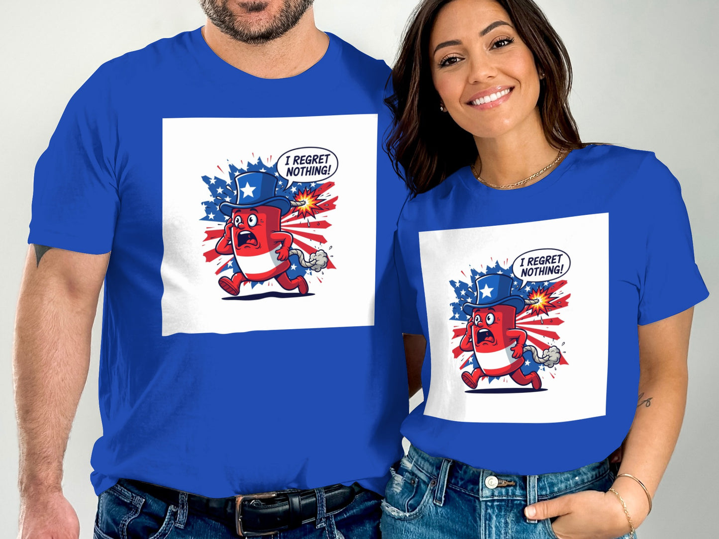 Couple in blue t-shirts featuring a patriotic cartoon character with text "I regret nothing!".