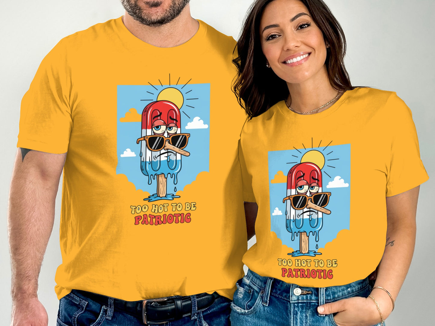 Couple wearing matching patriotic t-shirts with a melting popsicle graphic.