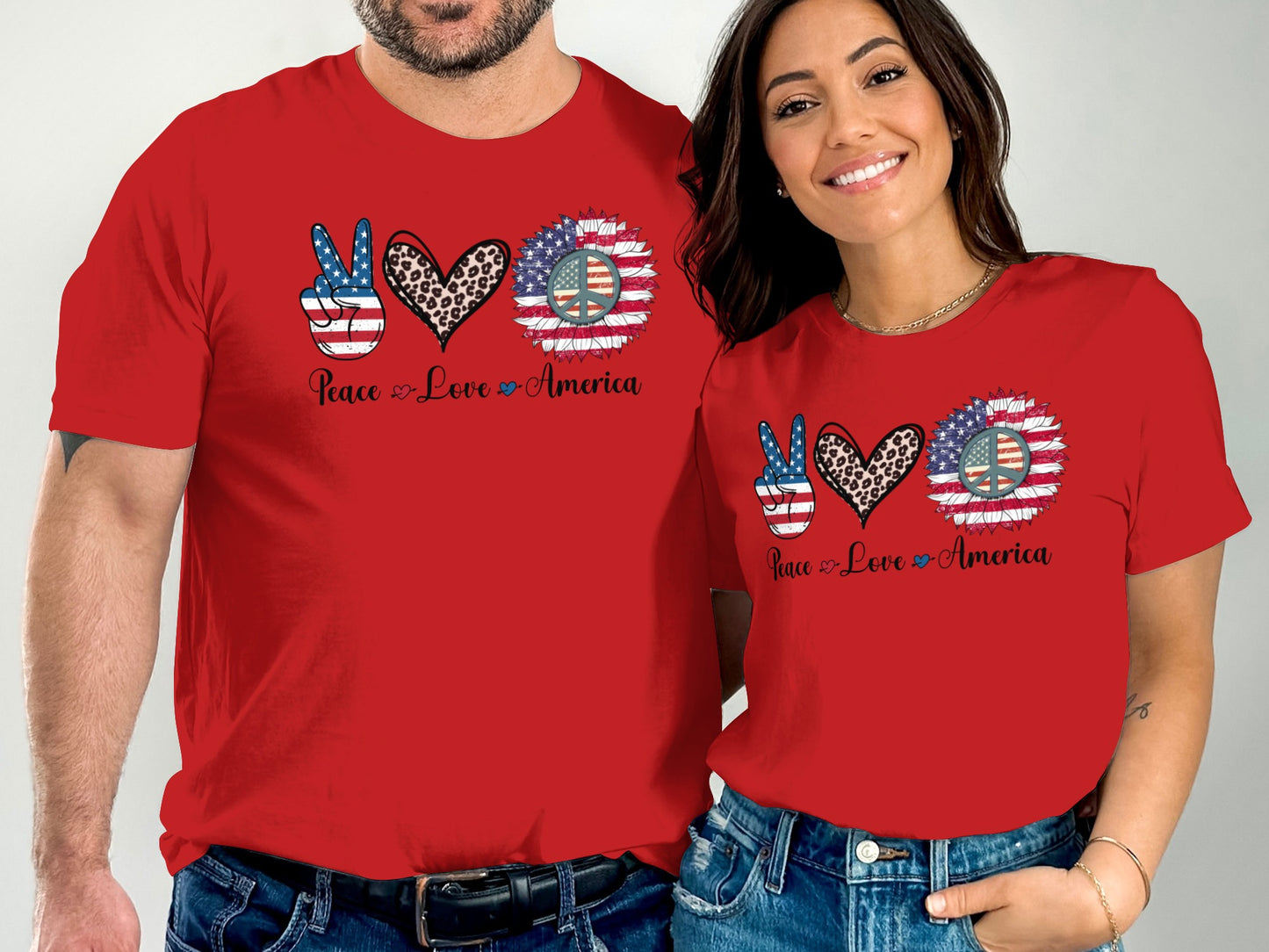 Couple wearing matching red t-shirts with peace, love, America sunflower design.
