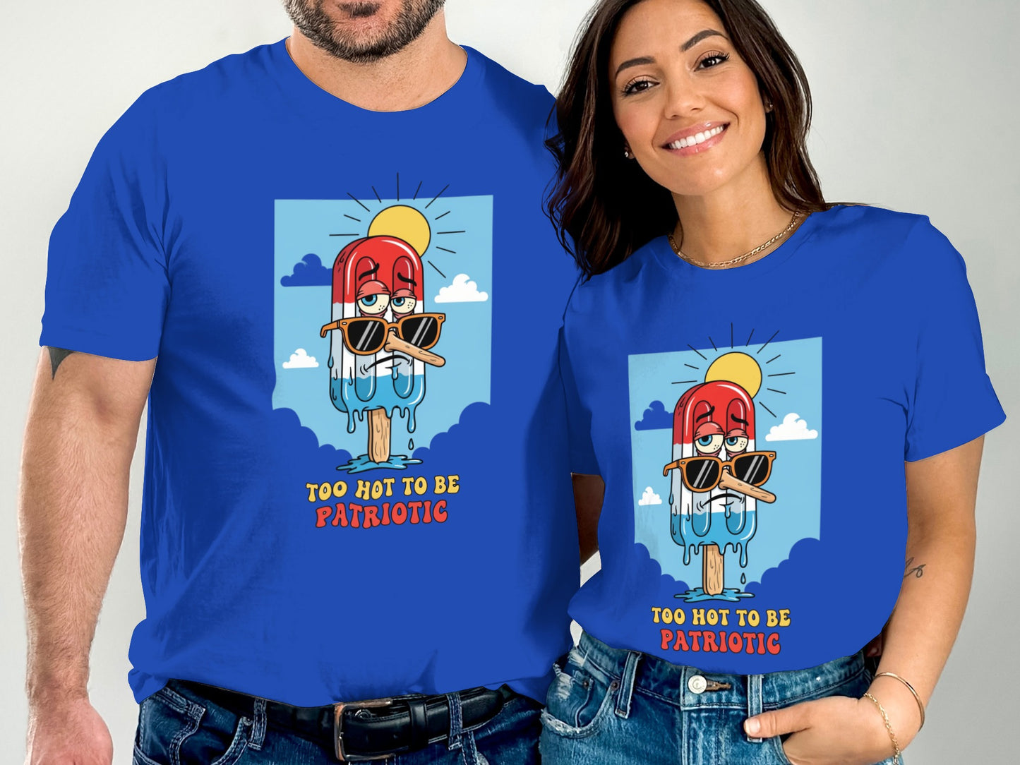 Two people wear matching blue t-shirts featuring a melting popsicle wearing sunglasses.