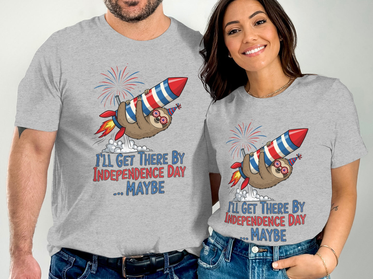 T-shirts with a sloth on a rocket and "I'll Get There By Independence Day... Maybe" text.