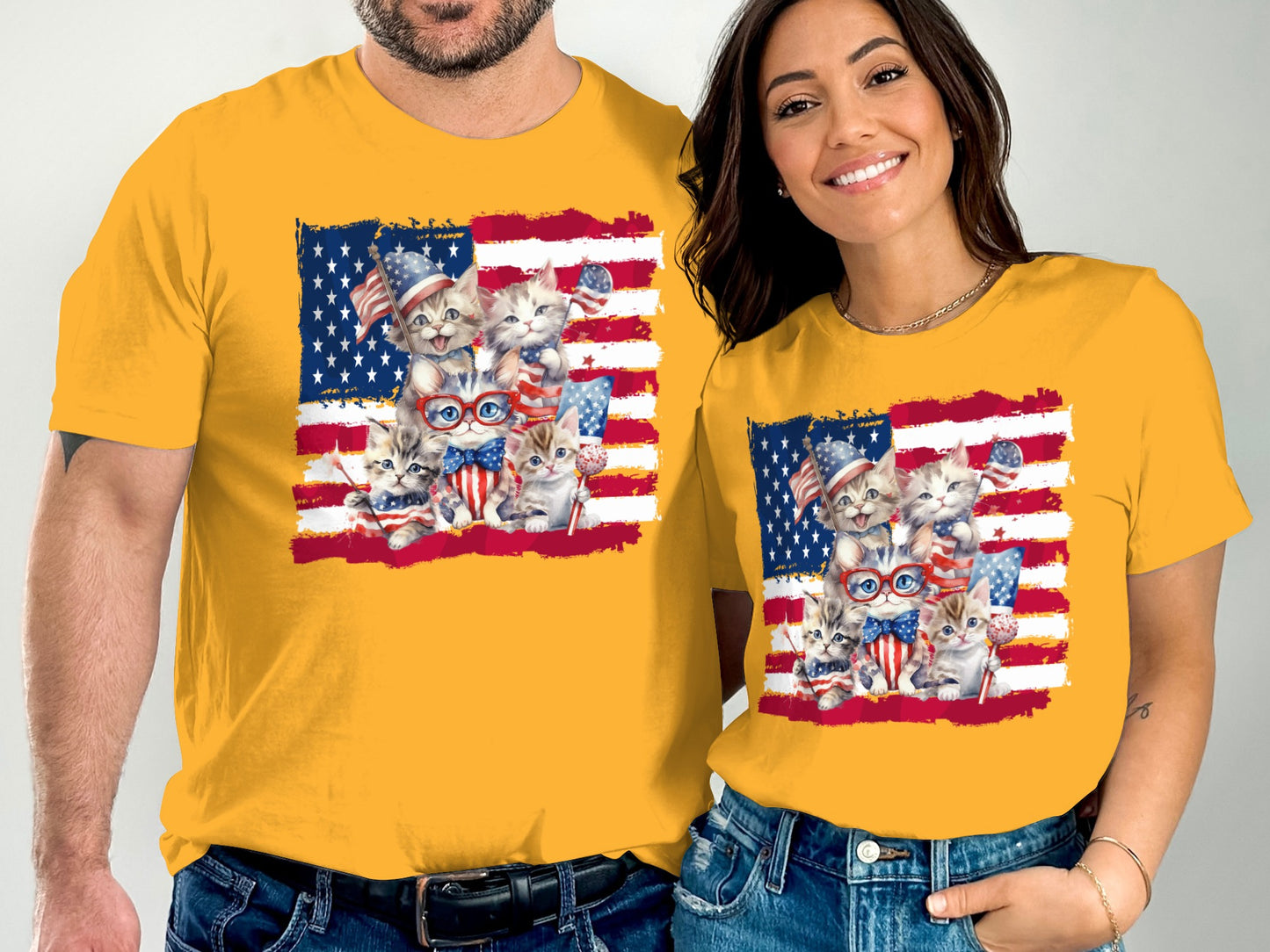 Couple wearing yellow t-shirts with patriotic kittens and American flags.