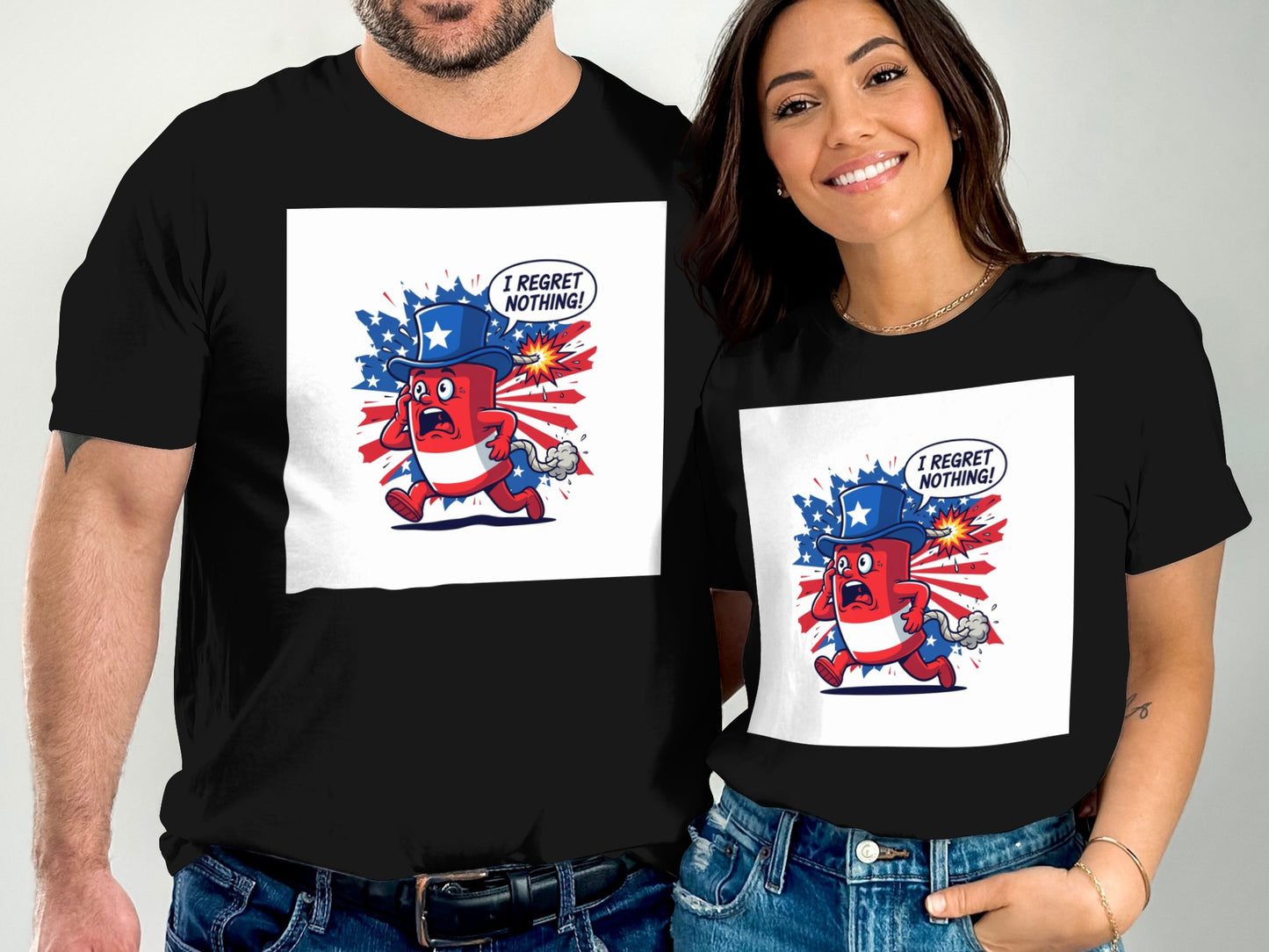 Couple wearing black t-shirts with cartoon fireworks celebrating freedom.