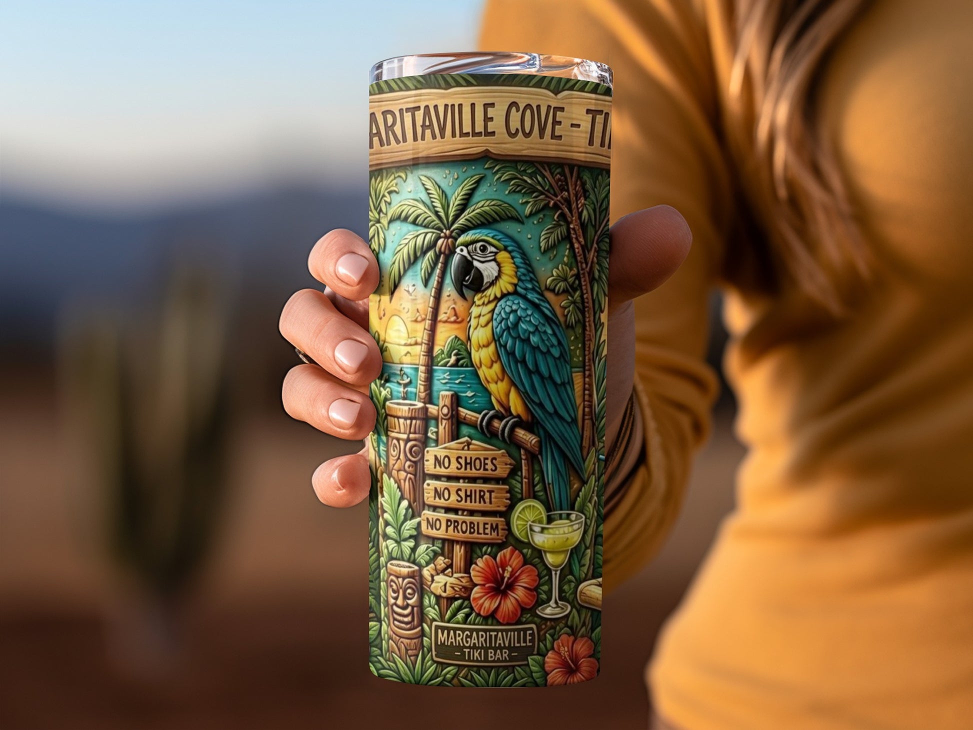 Tumbler with a blue parrot, palm trees, and "Margaritaville - Tiki Bar" text.