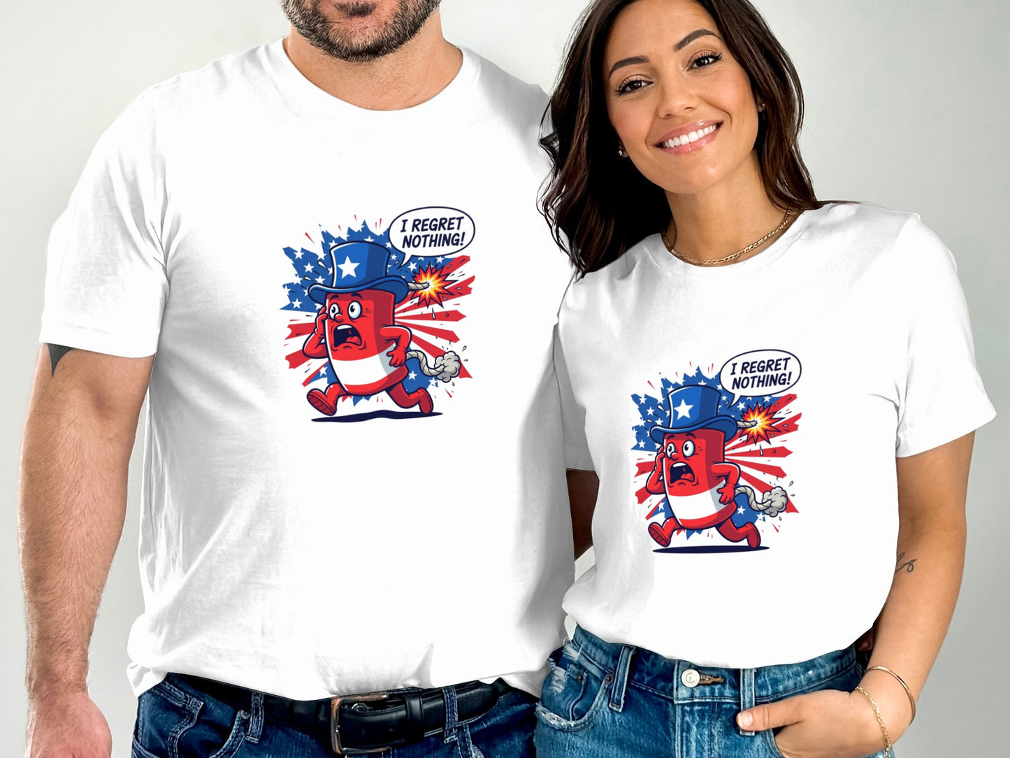 Two people wear white t-shirts with cartoon firecracker saying "I REGRET NOTHING!".