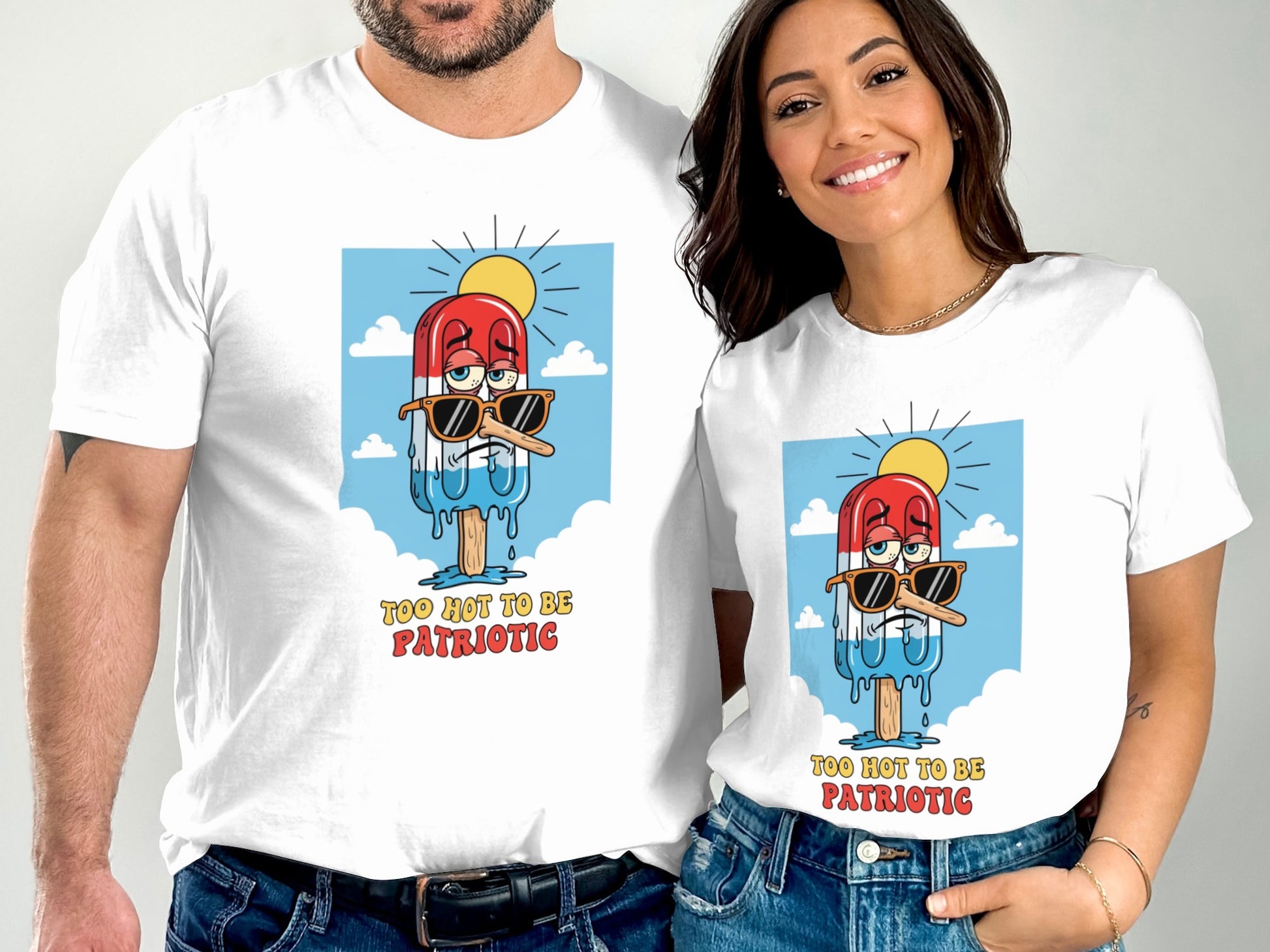 Two people wearing white t-shirts with a popsicle graphic and text "TOO HOT TO BE PATRIOTIC".