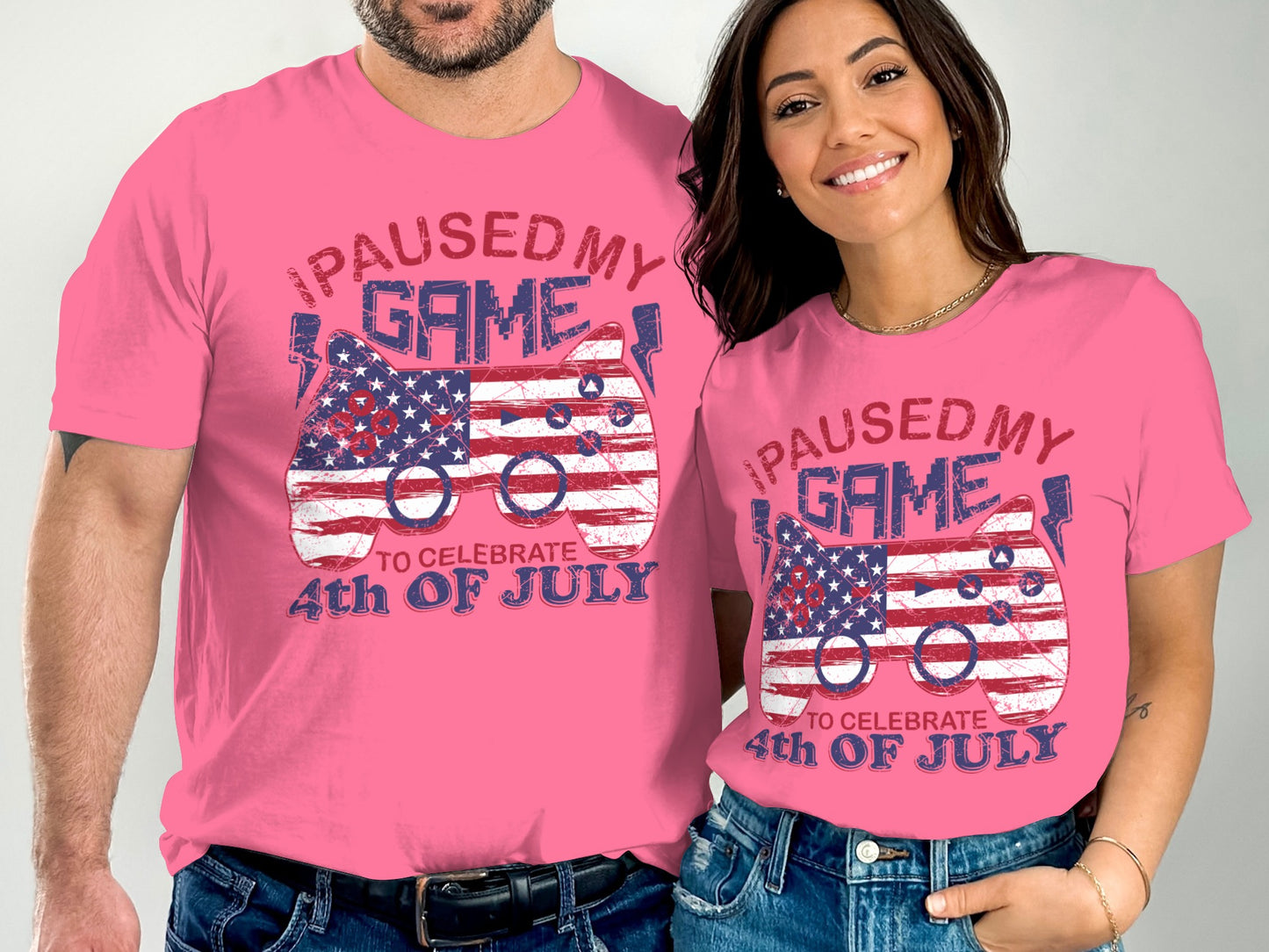 Pink t-shirts with "PAUSED MY GAME TO CELEBRATE 4th OF JULY" and American flag controller.