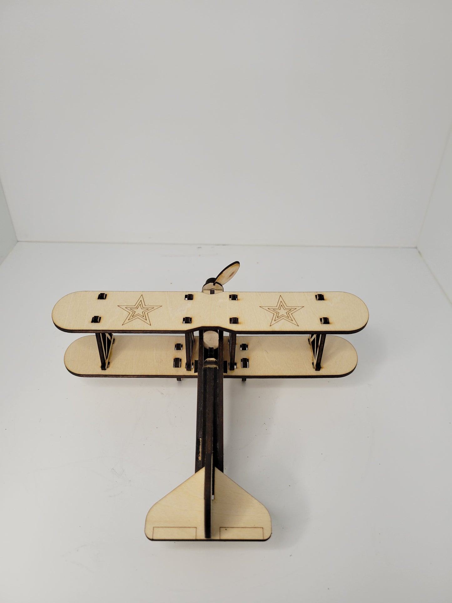 Vintage Biplane Model with Engraved Stars product