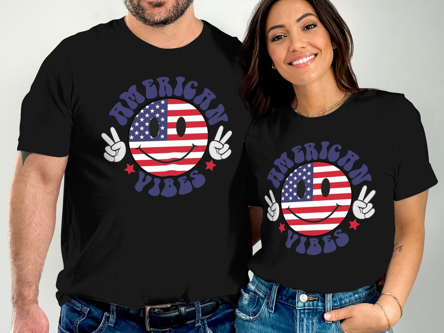 Black t-shirts featuring a smiling American flag smiley face with "American Vibes" text.