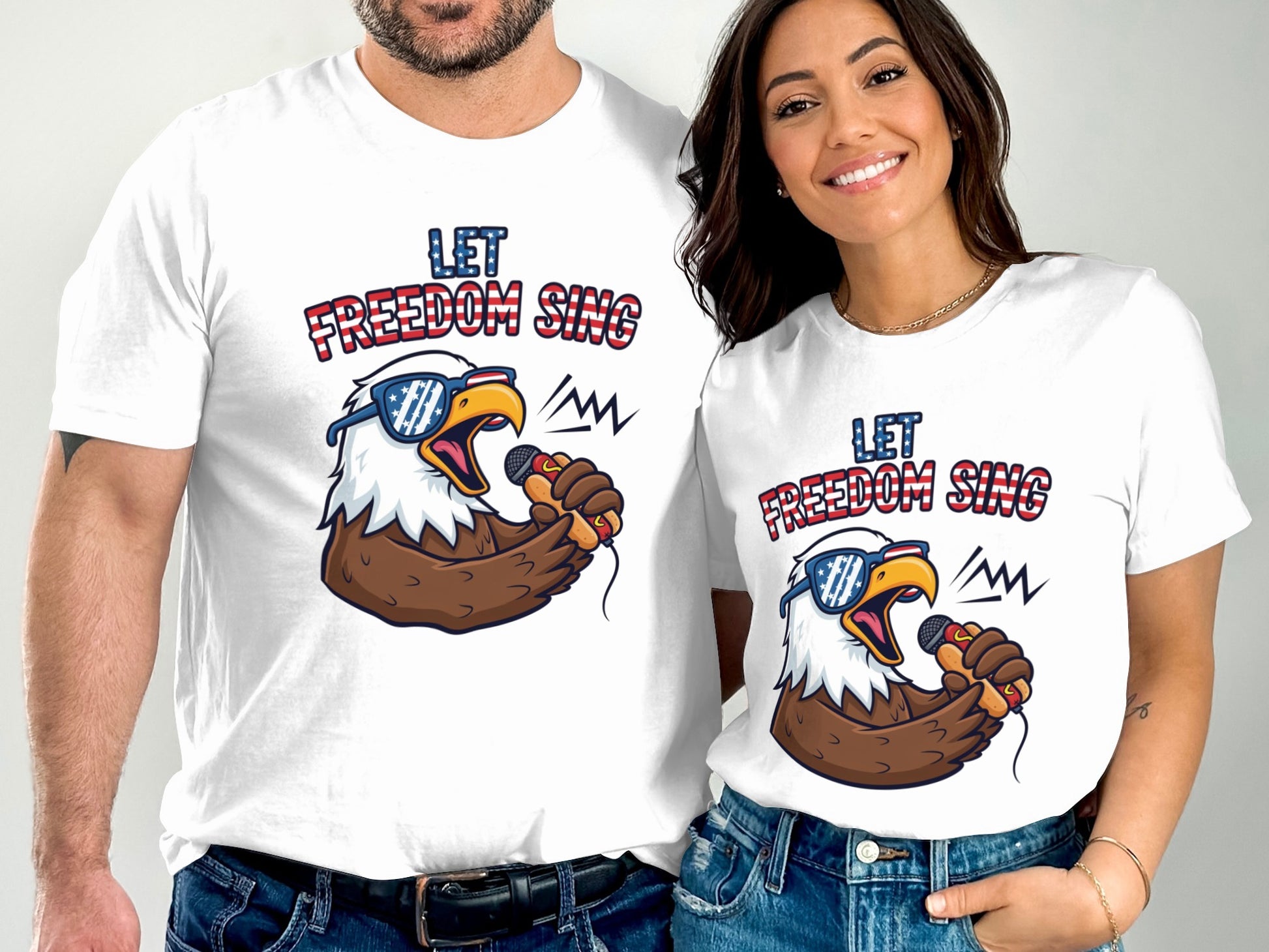 Couple wearing matching white t-shirts with an eagle singing into a microphone.