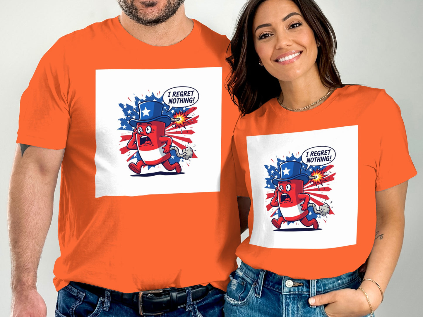 Couple wearing orange t-shirts with patriotic cartoon characters and "I regret nothing!" text.