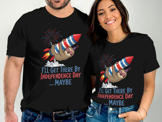 T-shirts featuring a sloth riding a rocket with "I'll get there by Independence Day... maybe" text.