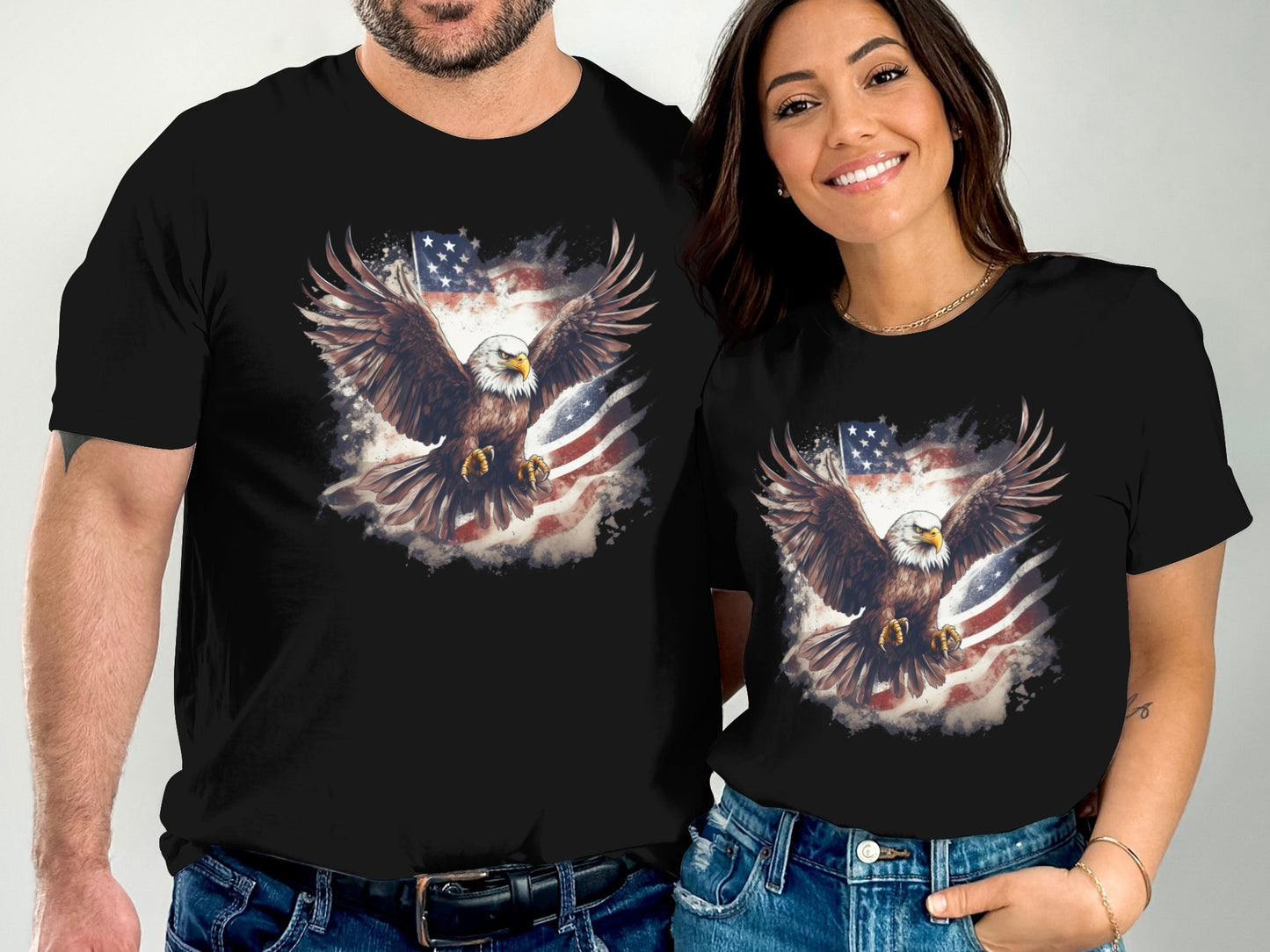 Two people wearing black t-shirts with a patriotic eagle design.