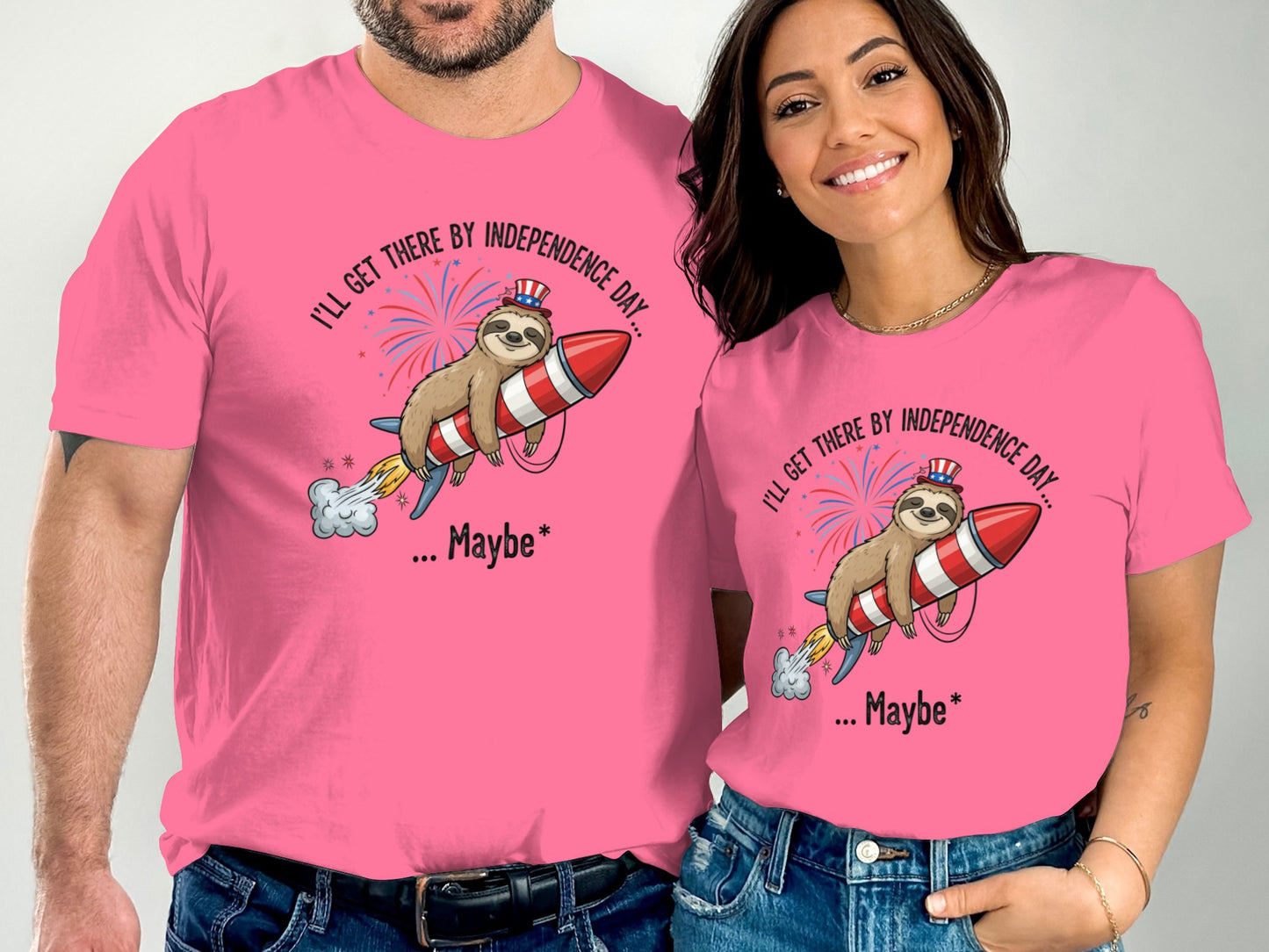 Pink t-shirts with sloth on rocket, "I'll get there by Independence Day..." text.