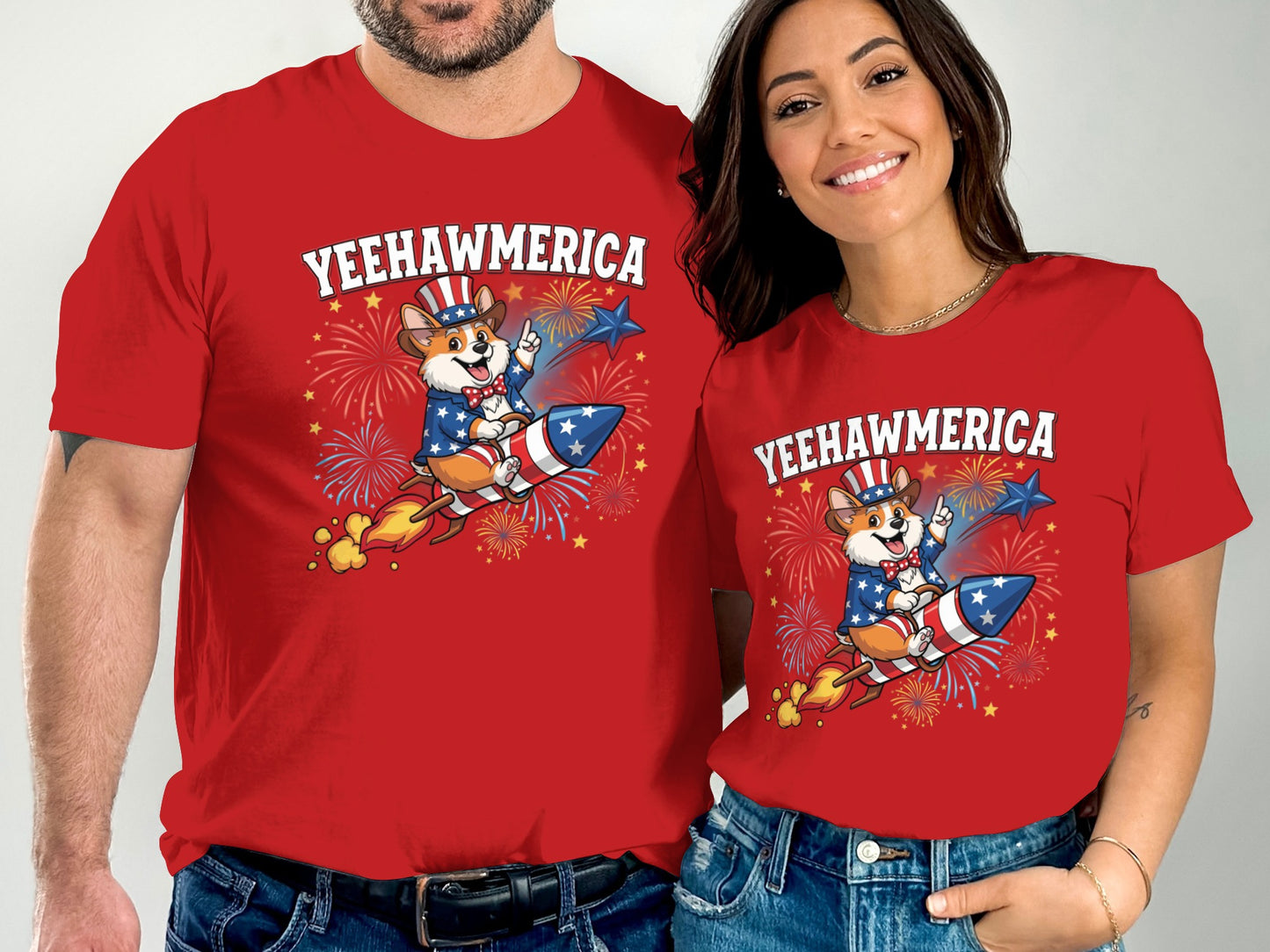 Couple wearing red "YEEHAWMERICA" t-shirts with patriotic bulldog on rocket.