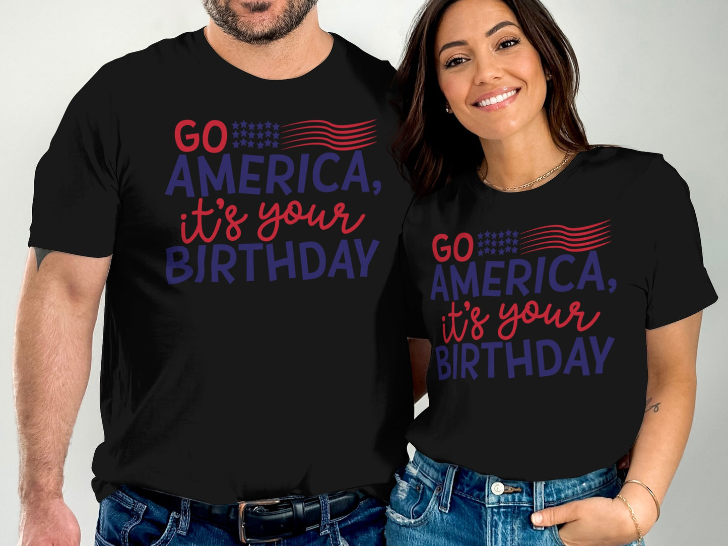 Two people wearing black t-shirts with "Go America, It's Your Birthday" text.