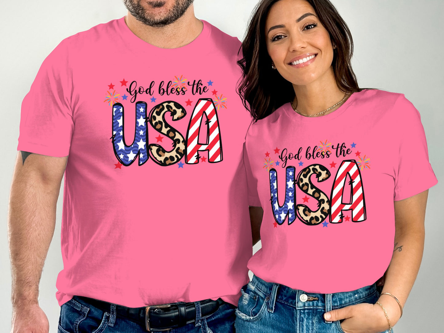 Pink t-shirts with "God bless the USA" and American flag graphic.