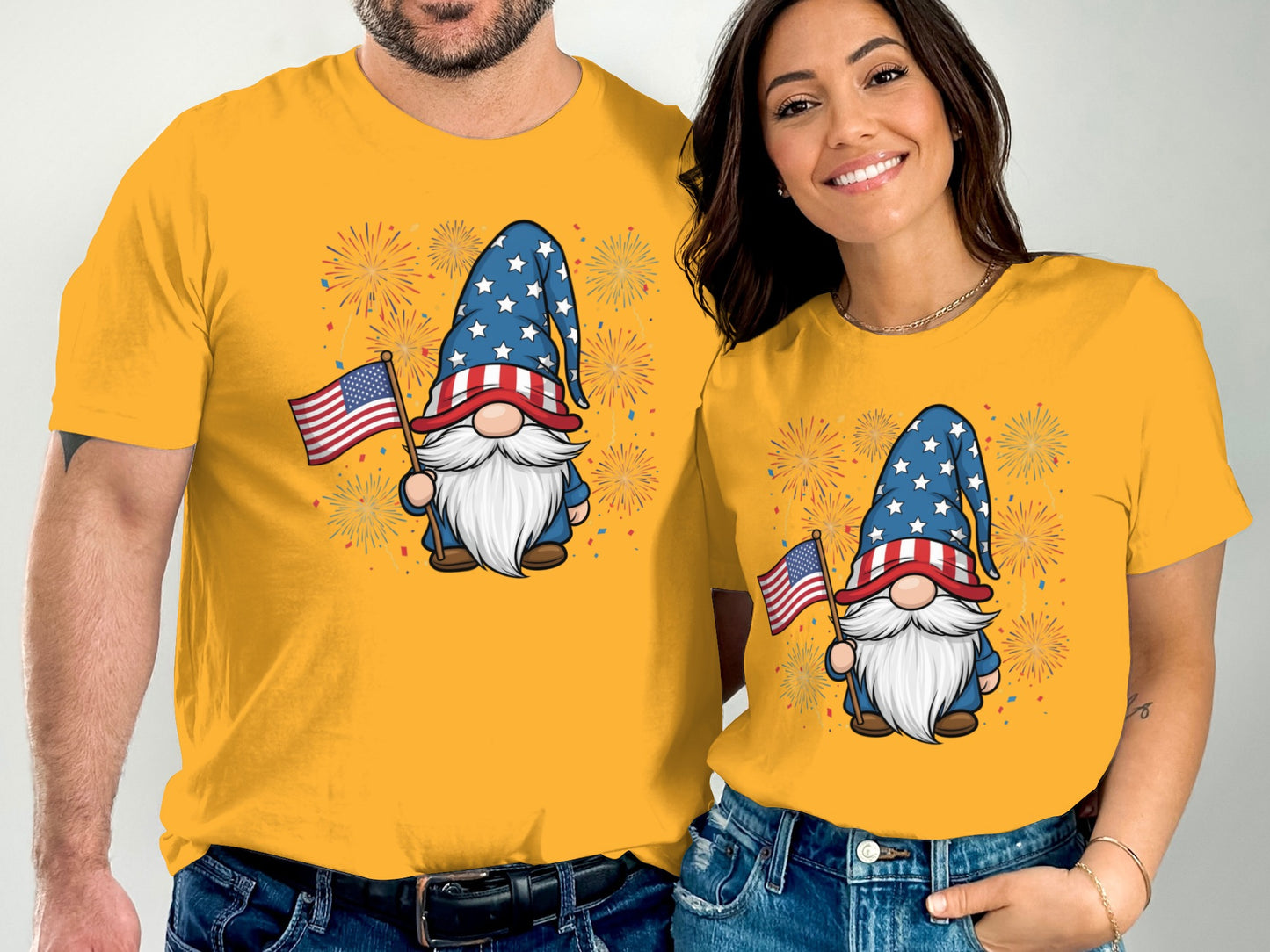 Couple wearing matching yellow t-shirts with a patriotic gnome design.
