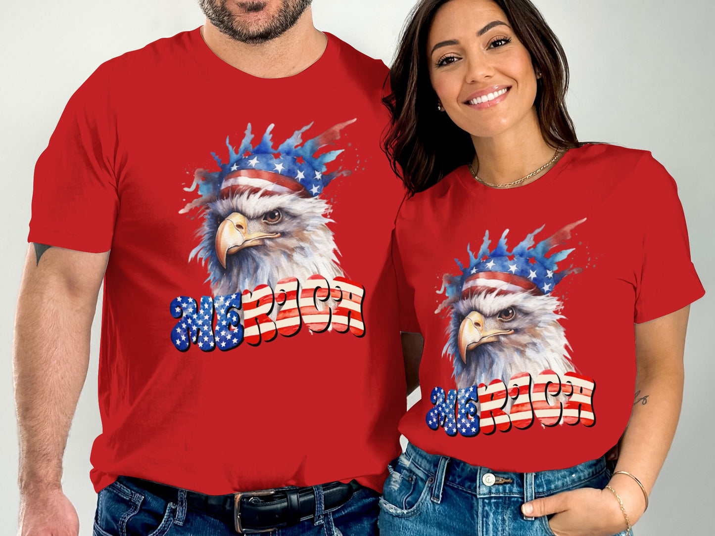 Couple wearing matching red t-shirts with eagle and "USA" design.