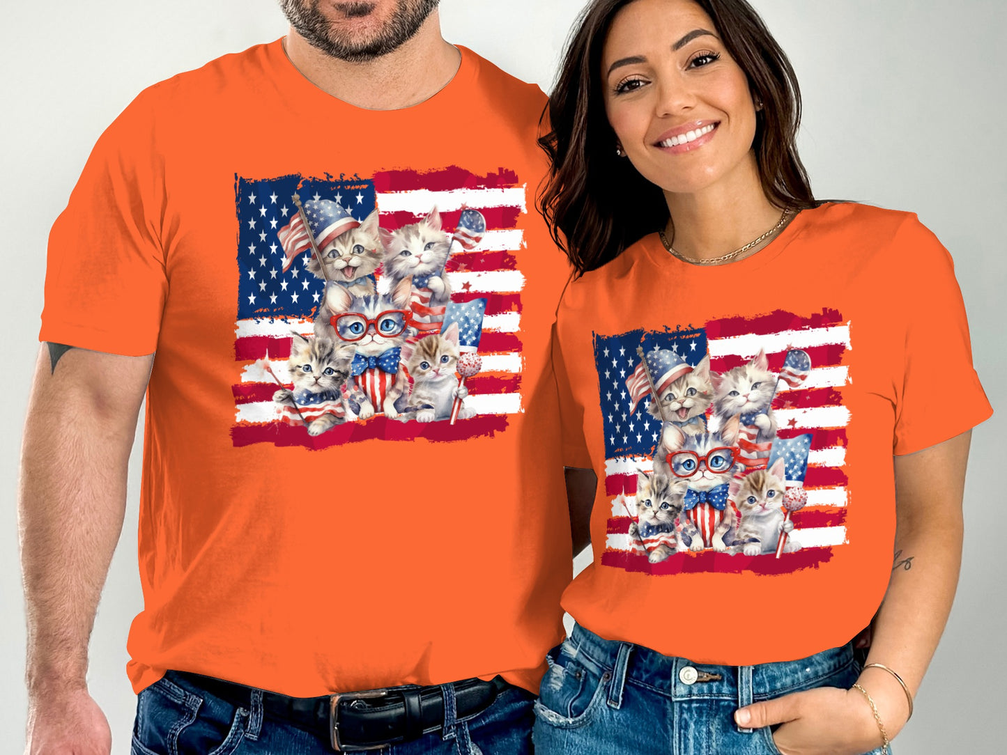 Orange t-shirts with patriotic kittens and American flags.