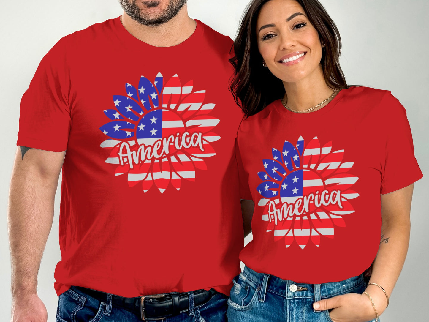 Couple wearing matching red t-shirts with American flag sunflower design.