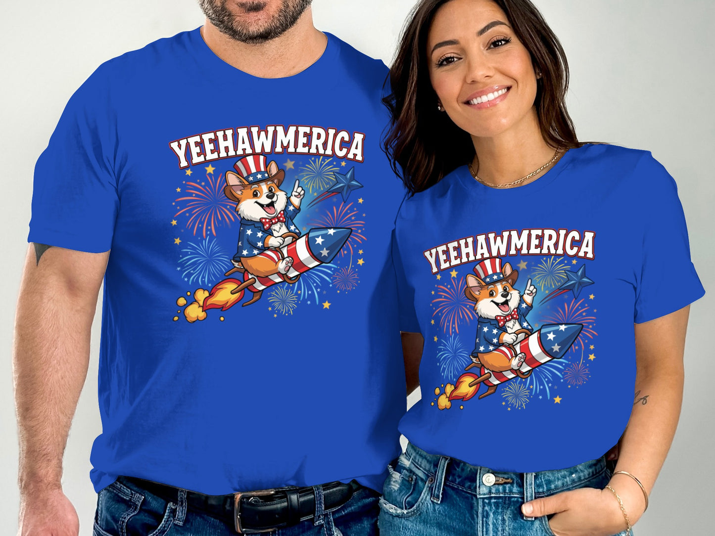Couple wearing blue "YEEHAWMERICA" t-shirts with patriotic rocket dog graphic.