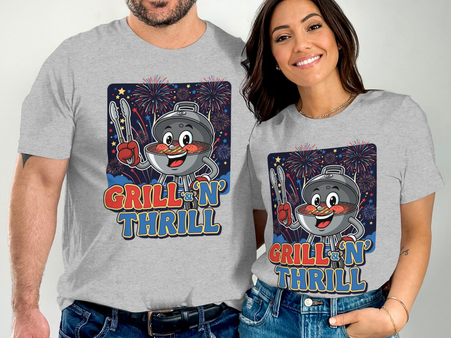 Couple wearing gray t-shirts with "Grill 'n' Thrill" and fireworks graphic.