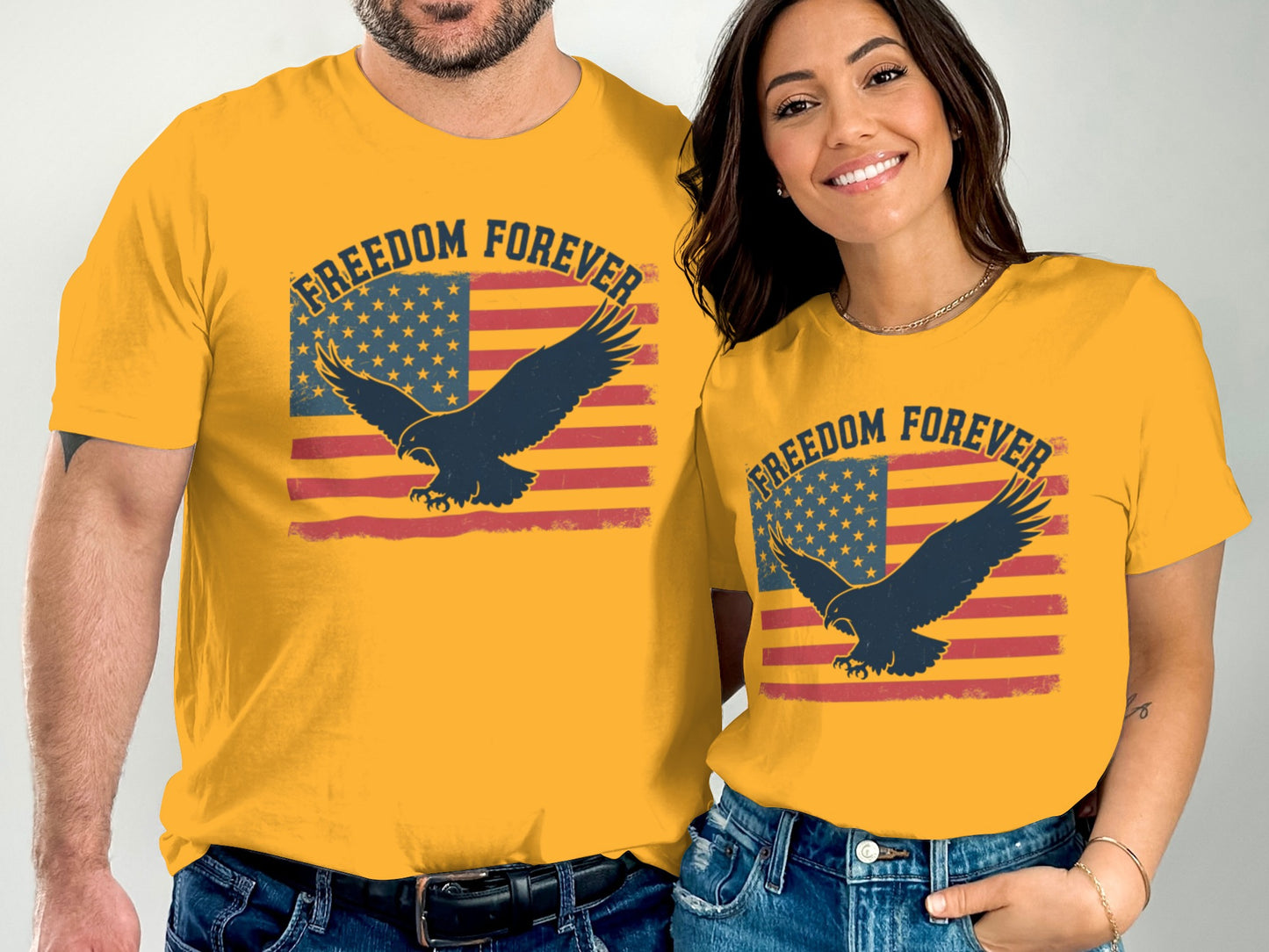 Couple wearing matching yellow t-shirts with eagle and "Freedom Forever" text.
