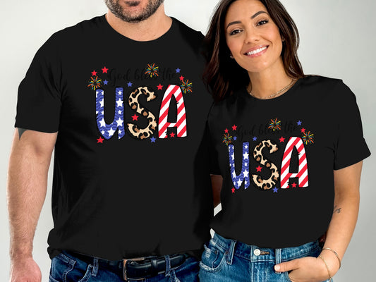 Couple wearing matching "God Bless the USA" patriotic t-shirts.