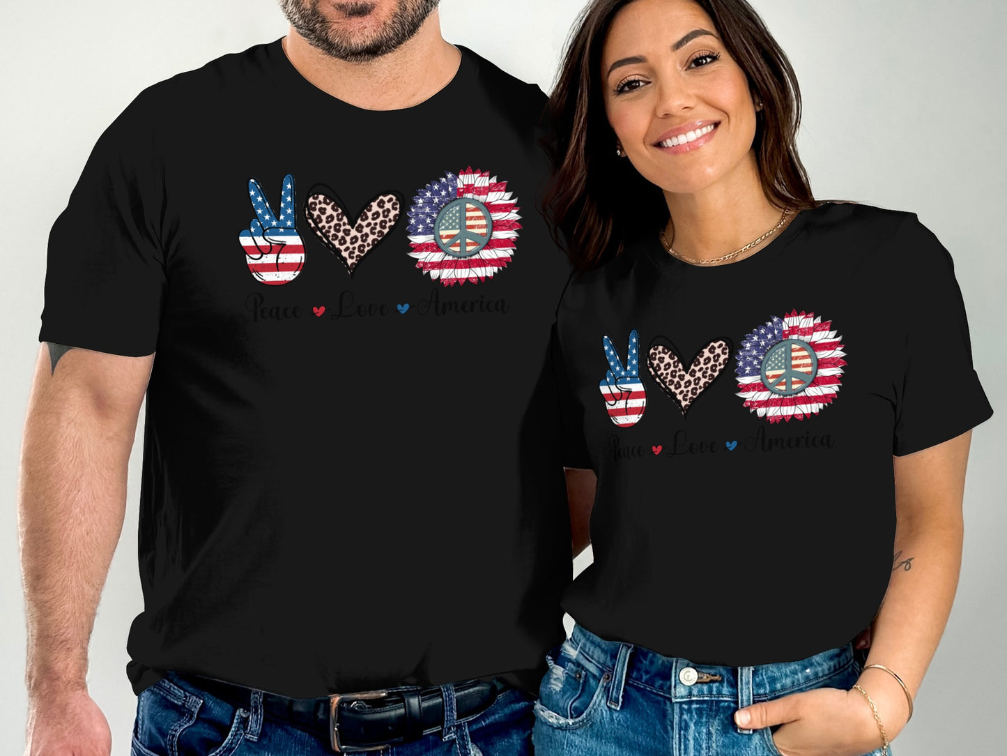 Black t-shirts with patriotic peace sign, heart, and sunflower designs.