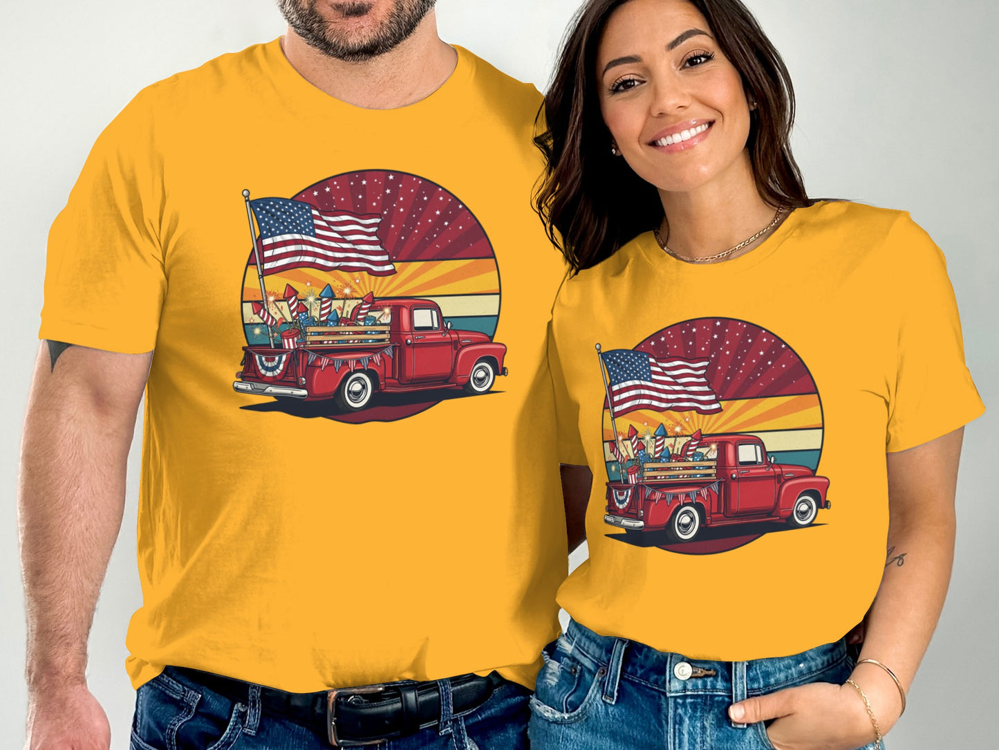 Red pickup truck with American flag and fireworks on t-shirts.