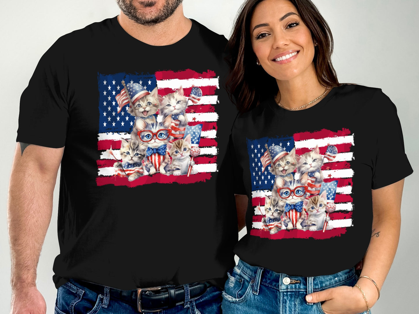 Two people wear black t-shirts with American flag and kitten graphic.