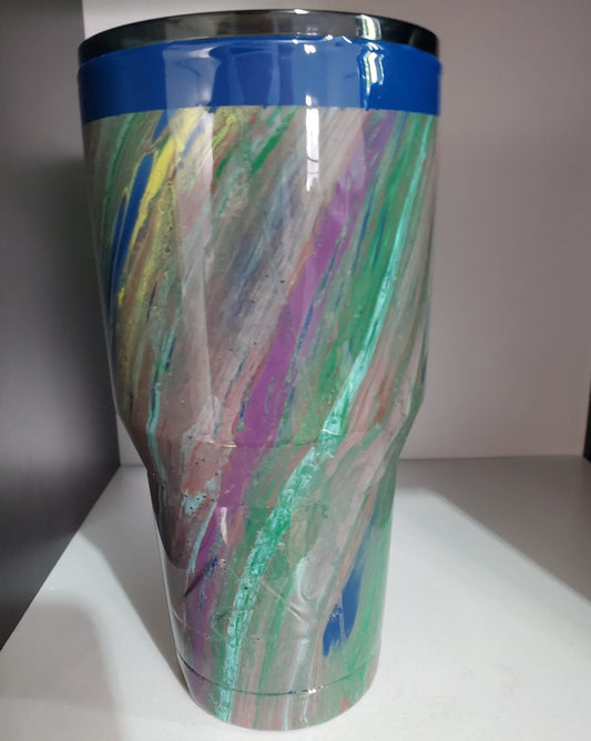 Colorful unique hydro dip Tumbler with blue rim and swirling multi-color design by Bates Custom Creations